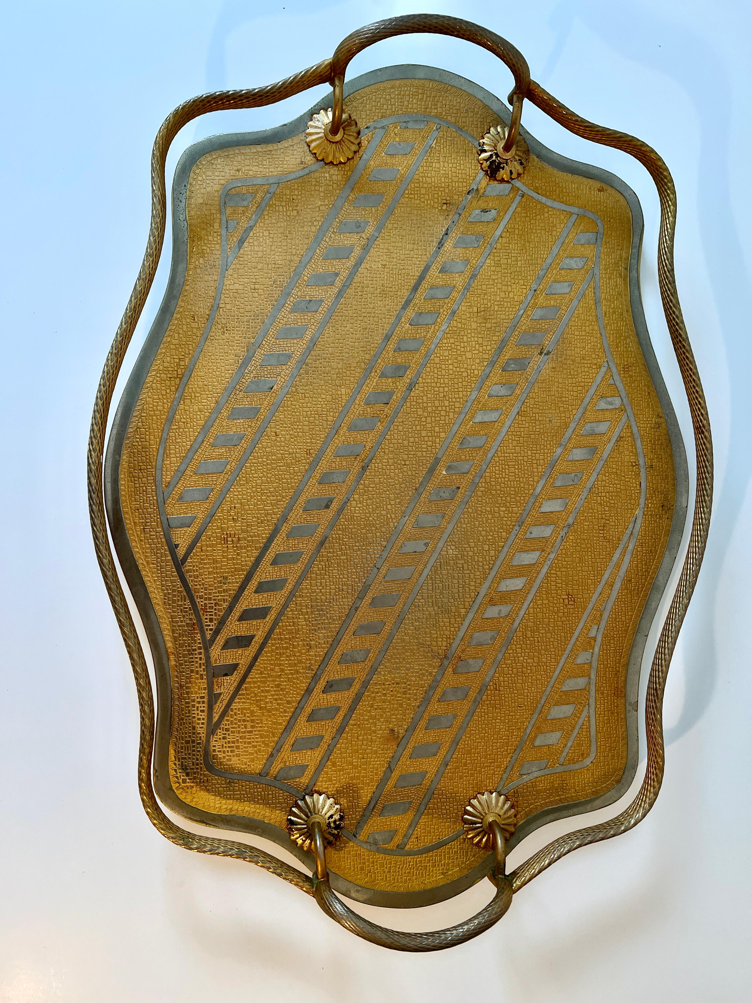 
Brass Tray with Braided brass gallery and handles.  A unique stripe is created with 'Brushed