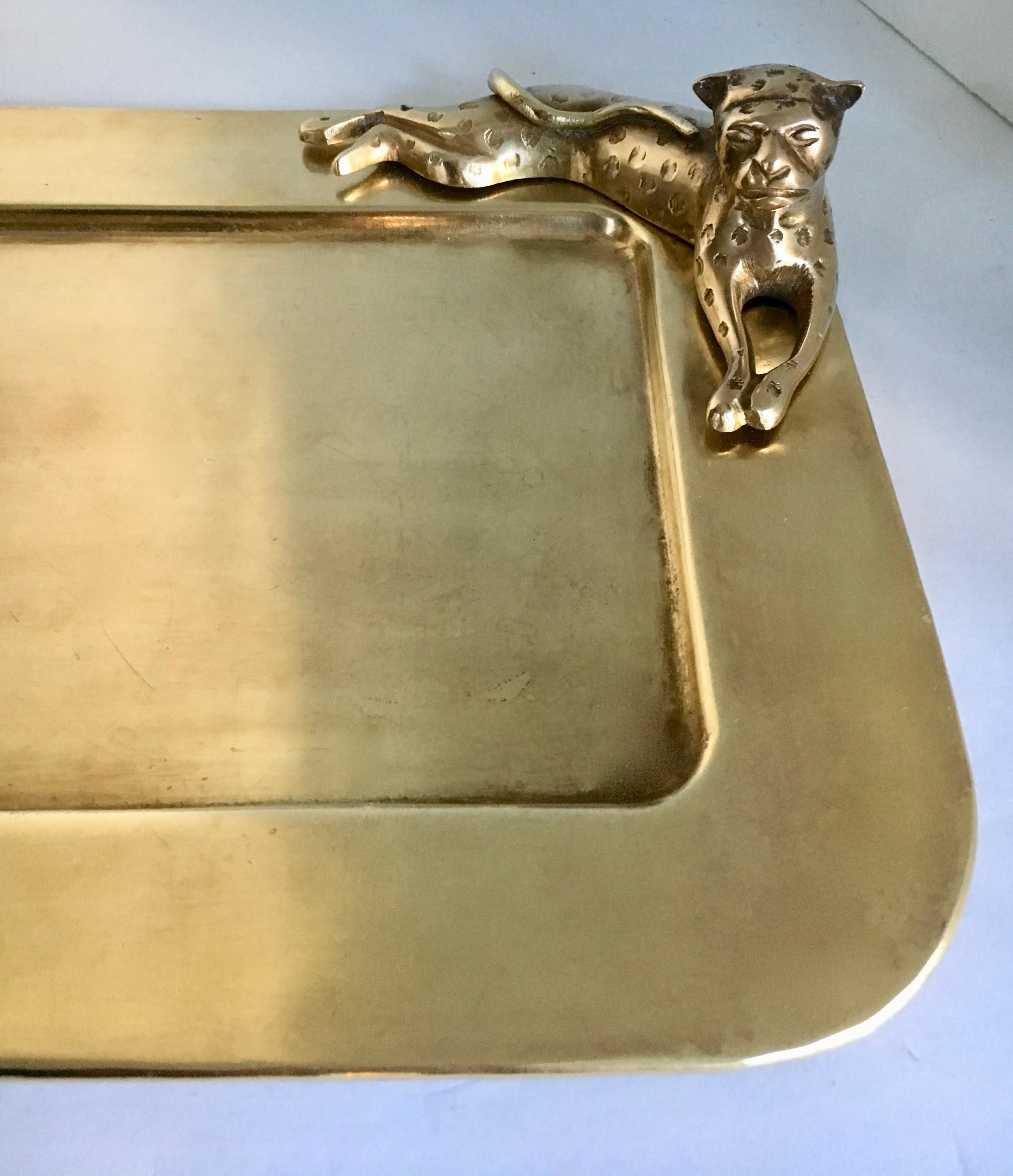 A beautiful brass tray with a 3-D Cheetah sitting on one corner. This tray is perfect for the desk, bar or serving. See how we display for serving drinks, catching mail, etc.