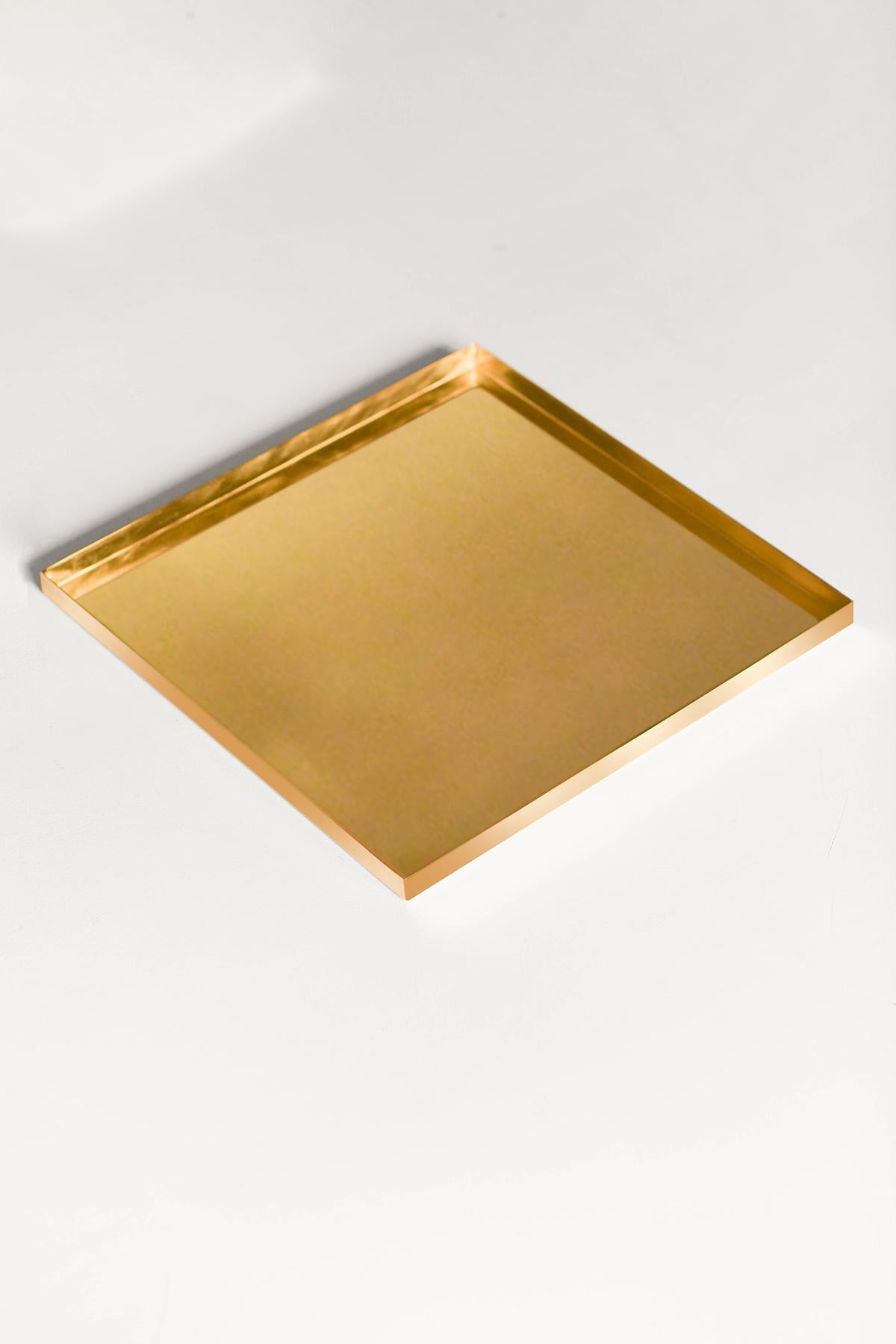 Brass trays “Molto” Editions
Italian Artisanal Production
Dimensions: 40W x 40D x 2 H cm.
This tray is also available in other sizes:
26x26cm  30x30cm  35x35cm 
Contact us for more information about size customizations