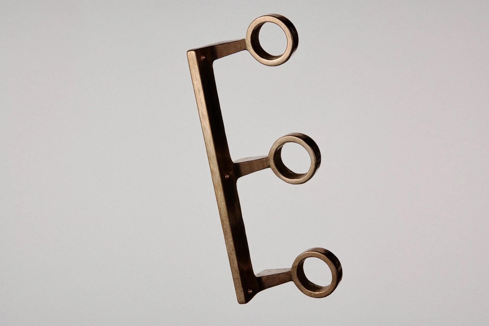 Modern Contemporary Golden Brass Trio Bottle Bracket by Henry Wilson For Sale