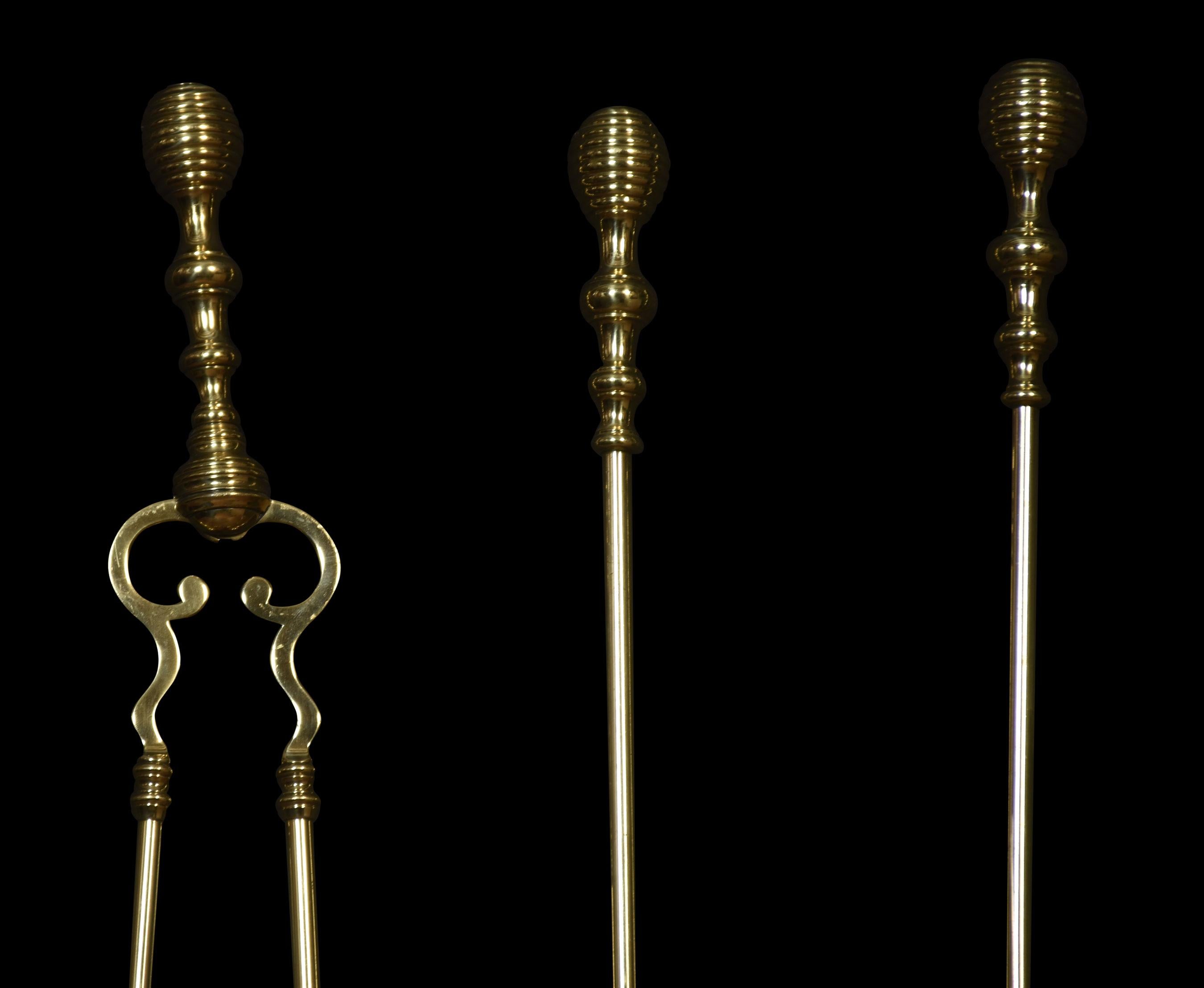Set of three brass fire tools, consisting of poker, tongs and shovel with well-casted handles.
Dimensions
Height 23.5 Inches
Width 5 Inches
Depth 3 Inches.