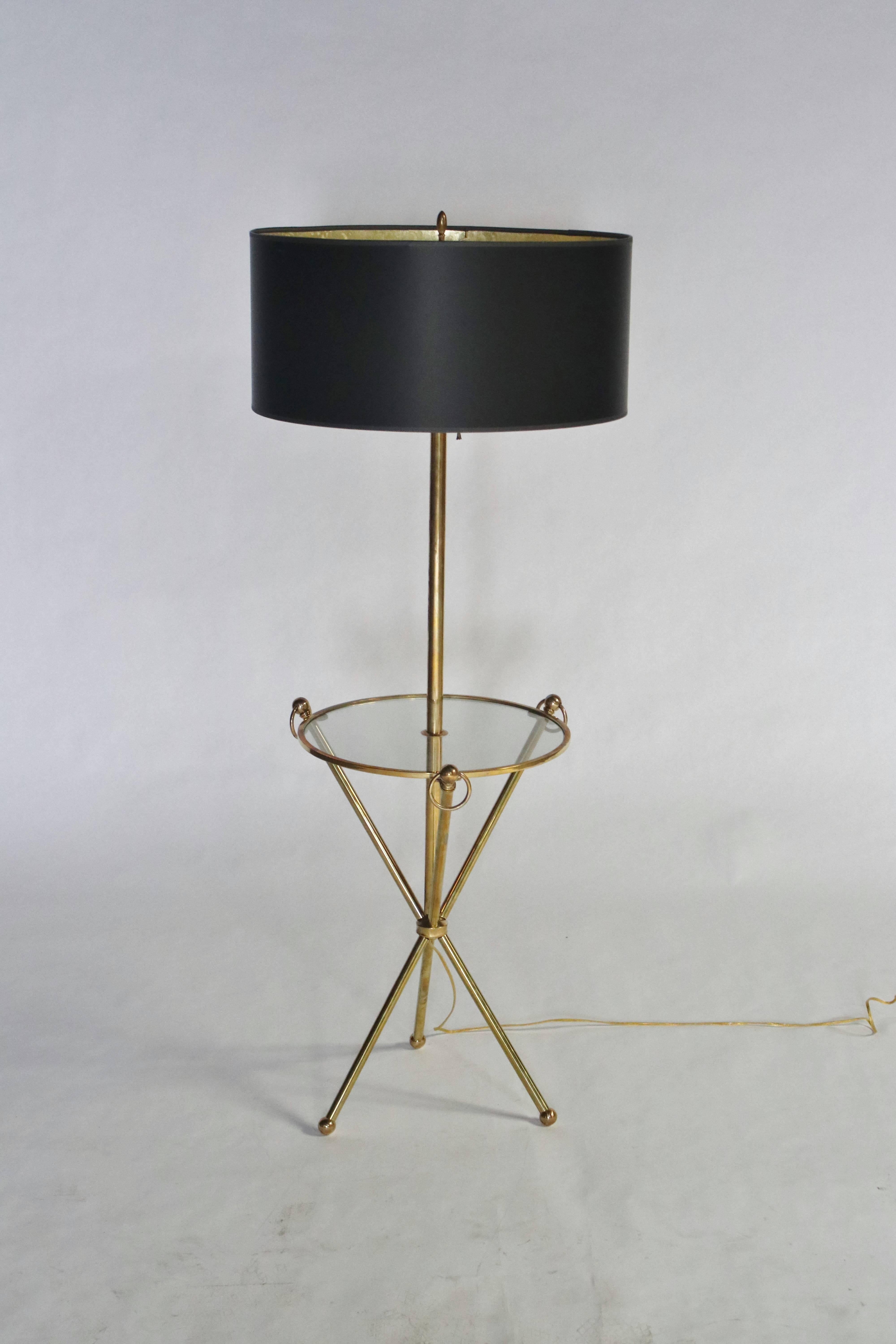 Midcentury brass and glass tripod floor lamp with loops handles, glass table and brass ball feet. Topped with a new custom black drum shade (21