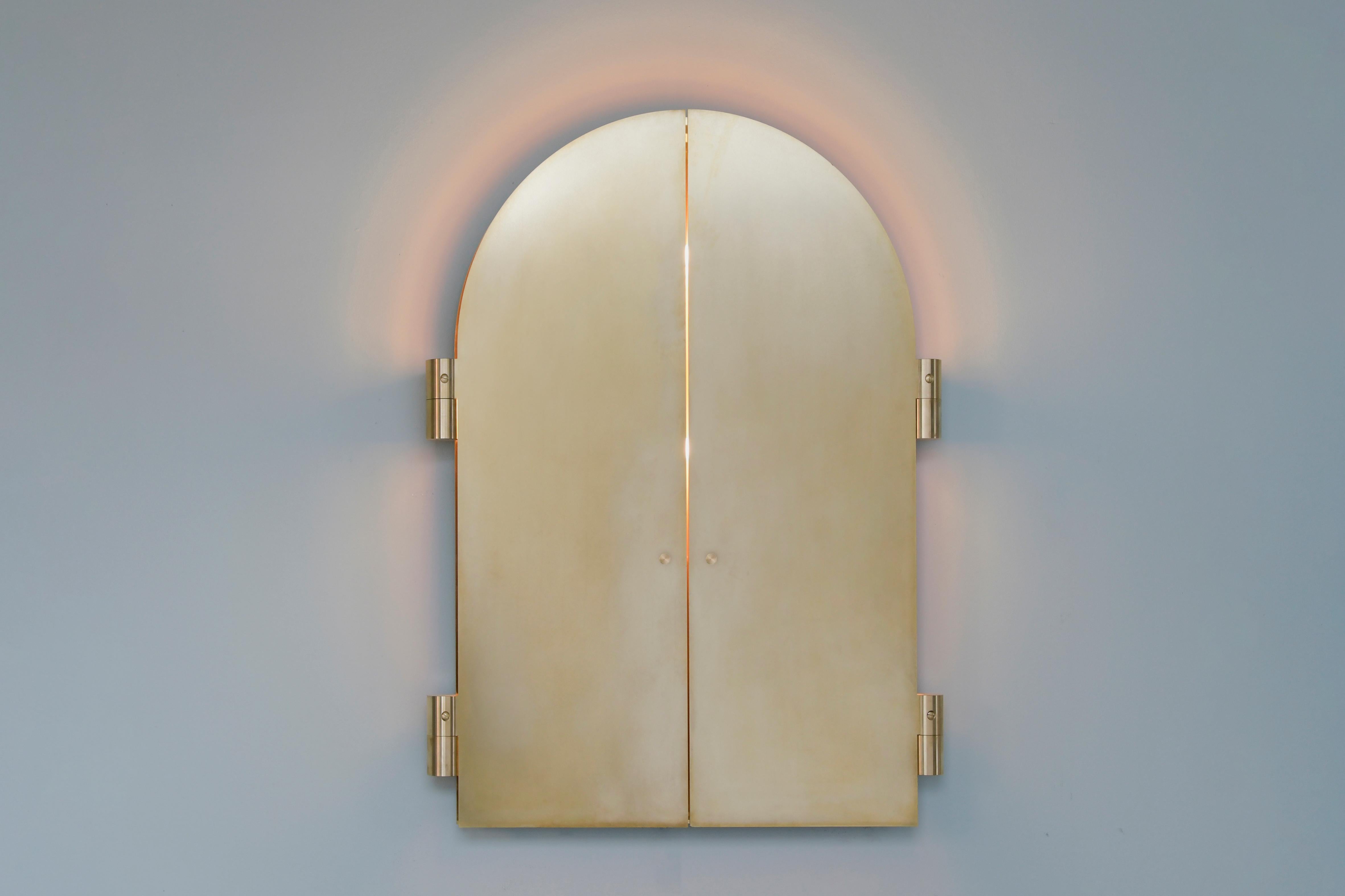 Brass triptychs enlighted mirror by Jesse Visser.
Dimensions: 100 x 140 x 5 cm
Brass, polished stainless steel, dimmable LED light.

The Triptych Circle is a circular triptych made out of polished brass. The doors consist of 3 mm brass and can