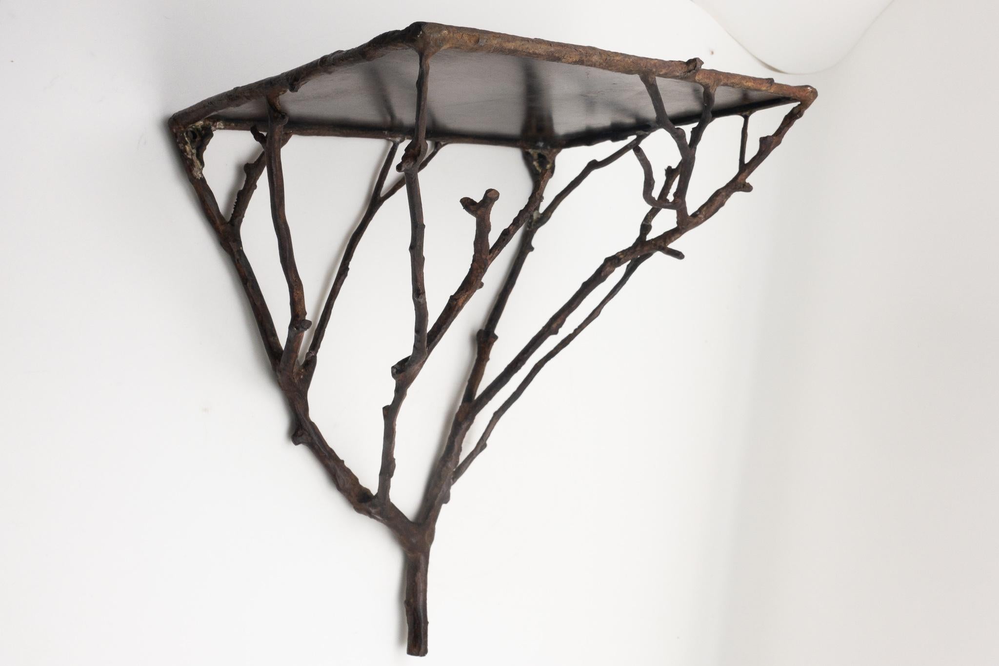 Organic and natural in design, this realistic twig wall bracket is cast in brass with a bronze finish.