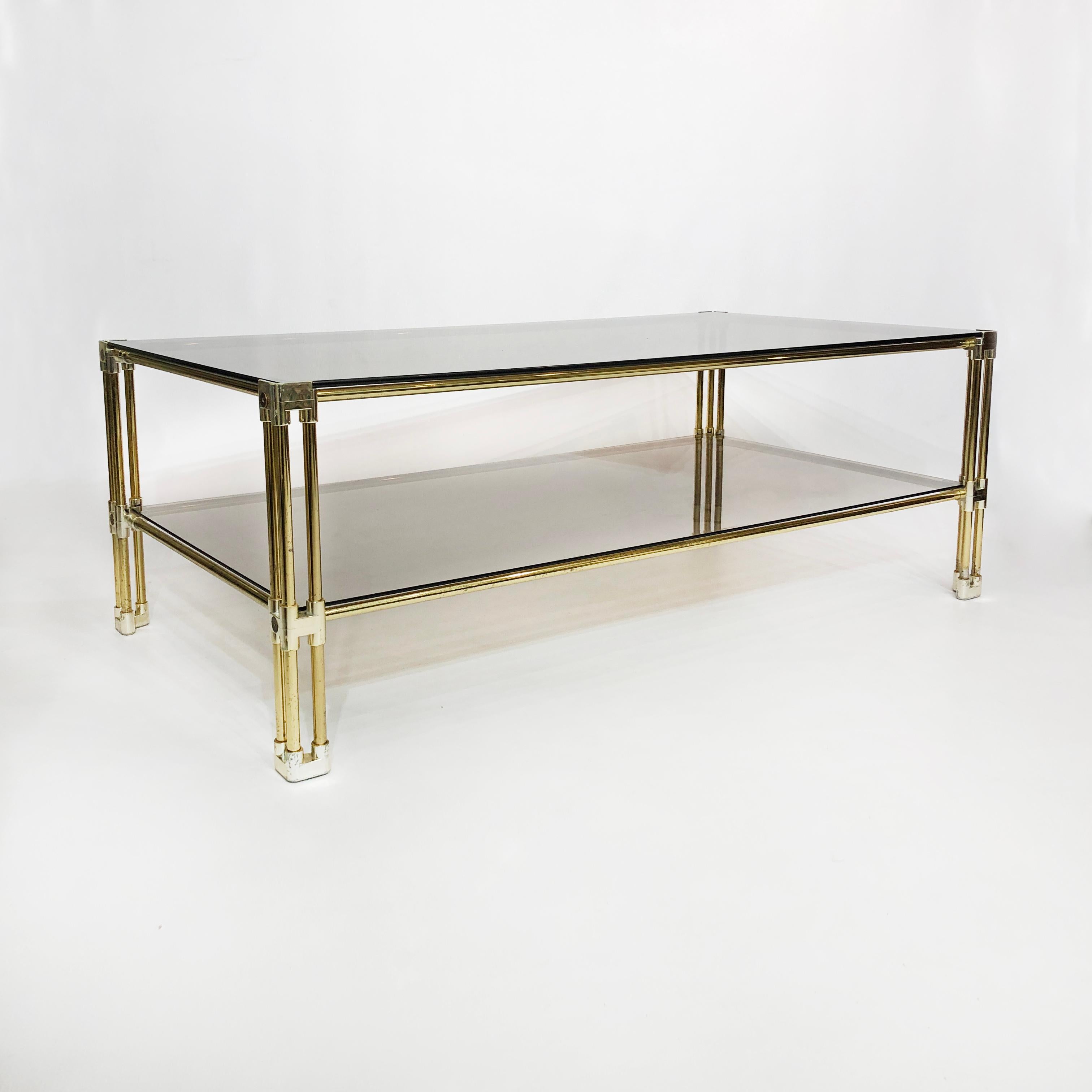 Brass Two-Tiered Coffee Table Hollywood Regency Gold Smoked Glass 1970s Glamour In Good Condition For Sale In London, GB
