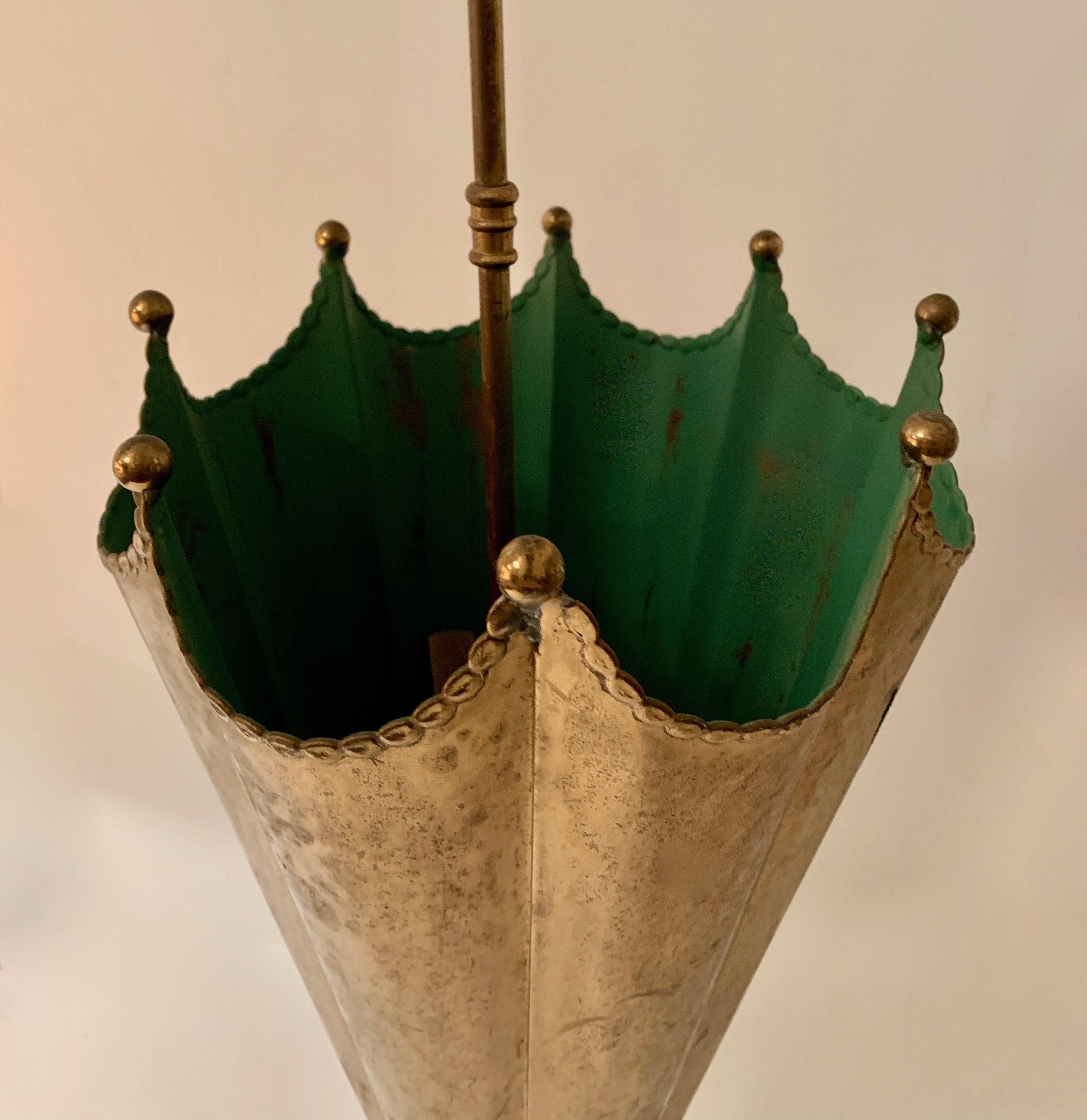 Brass umbrella shaped umbrella stand, Mid-Century Modern, a wonderful umbrella stand with the shape of an umbrella. These are our most popular umbrella holders and they sell fast. This stand, however, is a bit more detailed with a division inside to