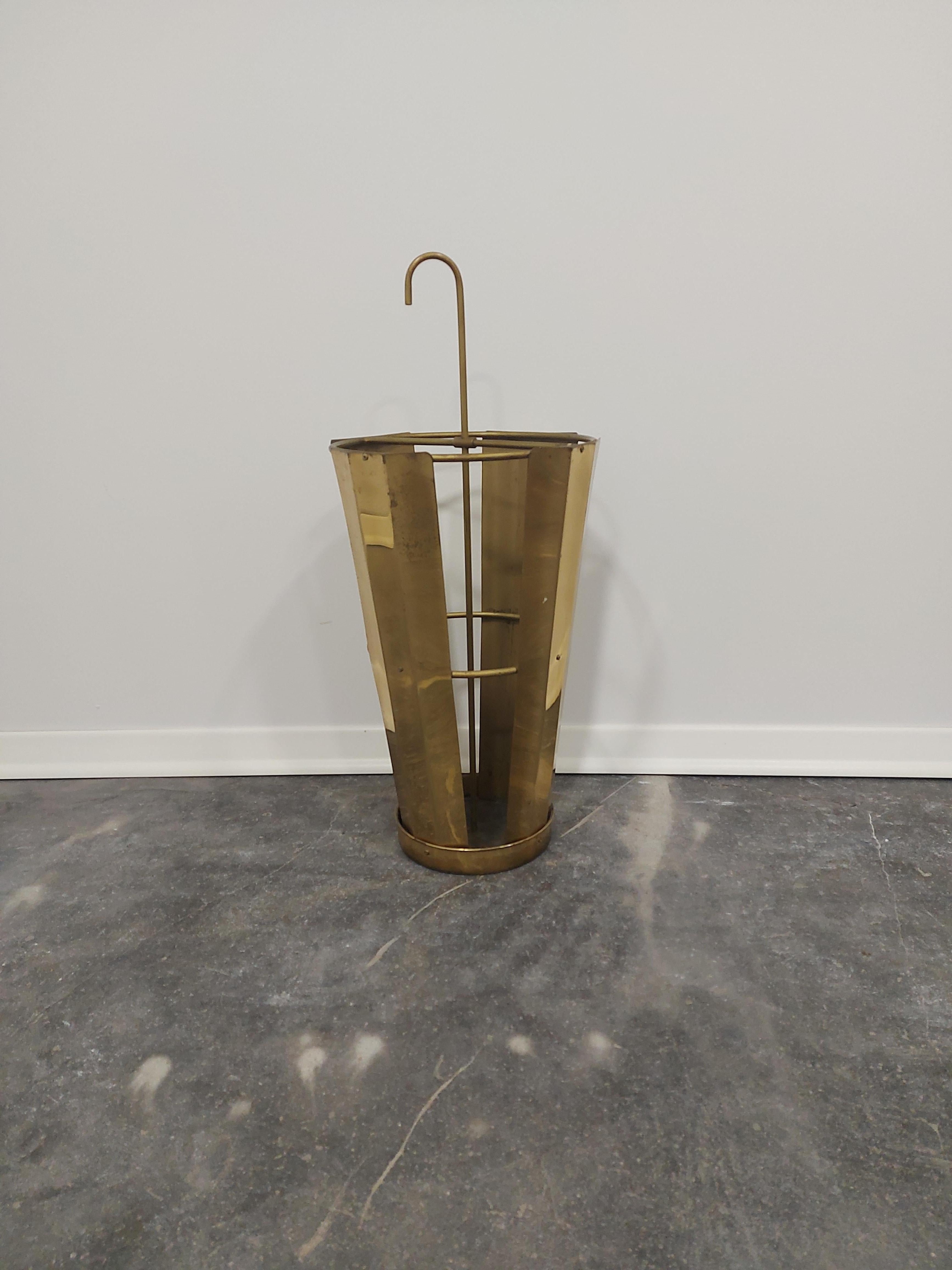 Unique Umbrella Stand, 1960s.

Beautiful Vintage patina.

Condition: Great

Material: Brass.

Measures: height cm - 68, width - 31 cm.