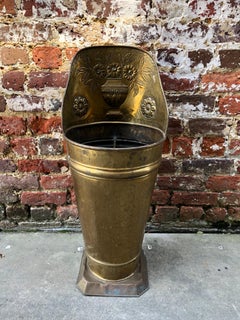 Brass umbrella stand with floral motif