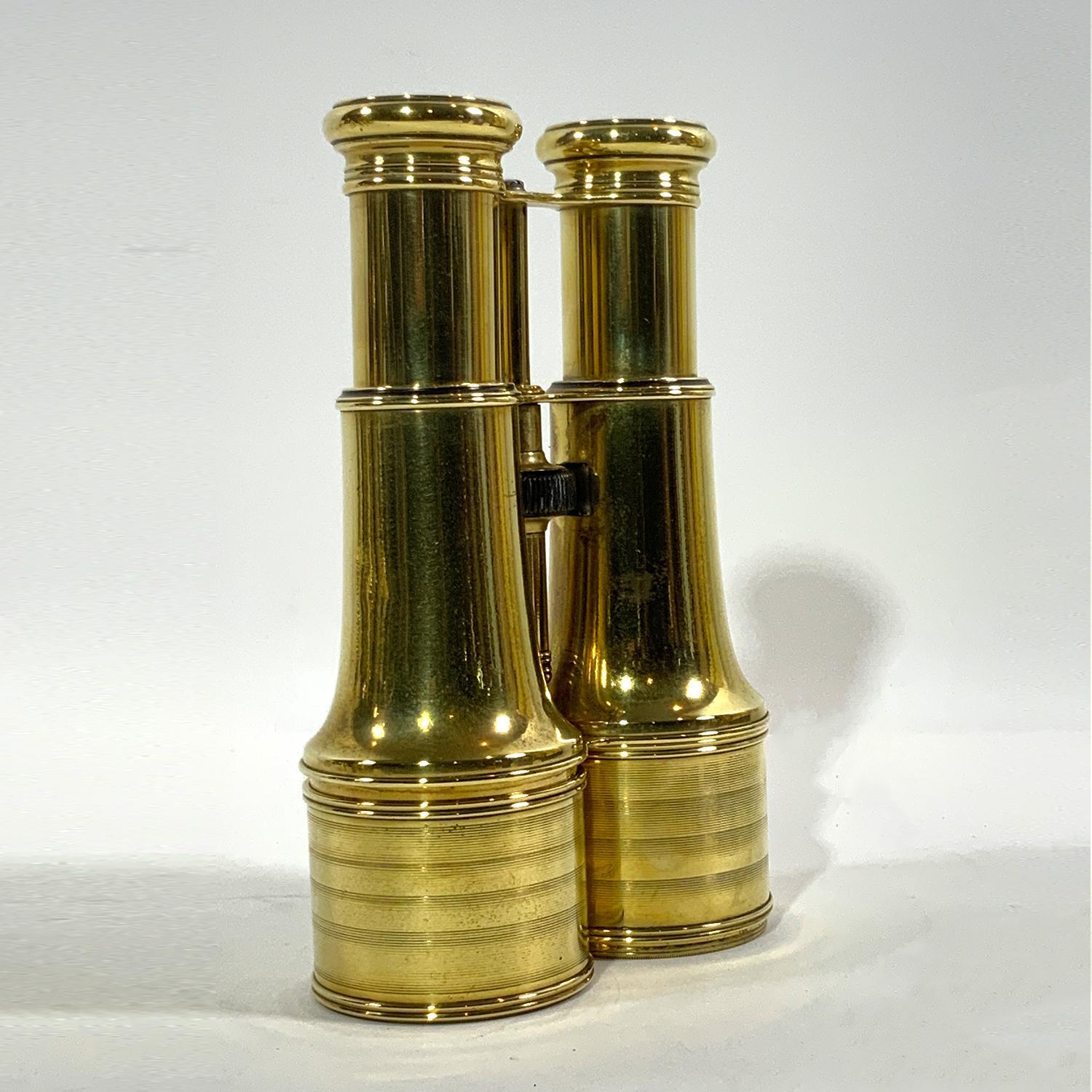 World War I U.S. Navy Officer's binoculars. Binoculars are by Lemaire of Paris as embossed on eyepieces. Knurled focus knob, sun shades on twin barrels. Highly polished and lacquered, Circa 1890. Binoculars are engraved U.S. Navy Number 16638.