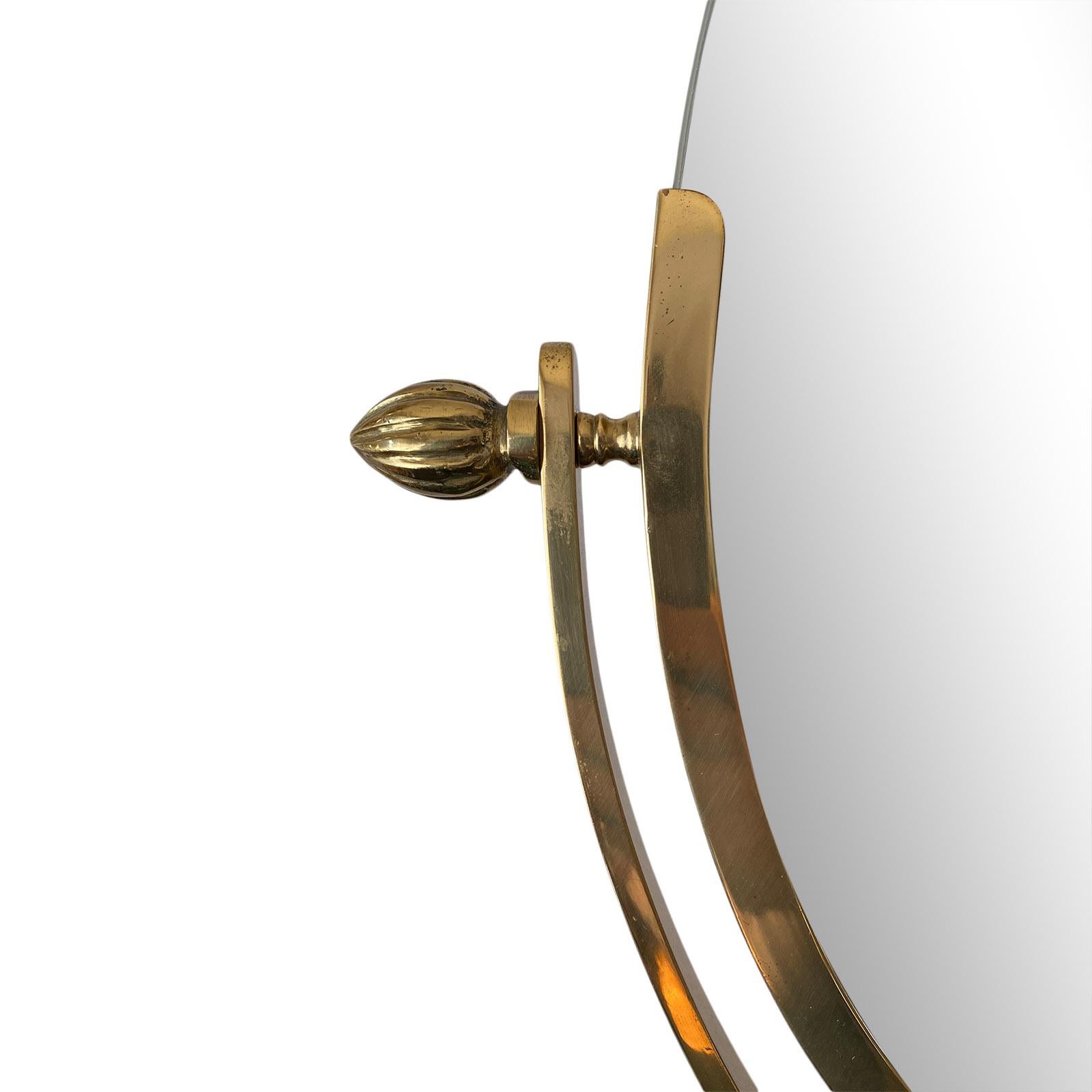 Brass vanity mirror in the style of Charles Hollis Jones. Only mirror is 10