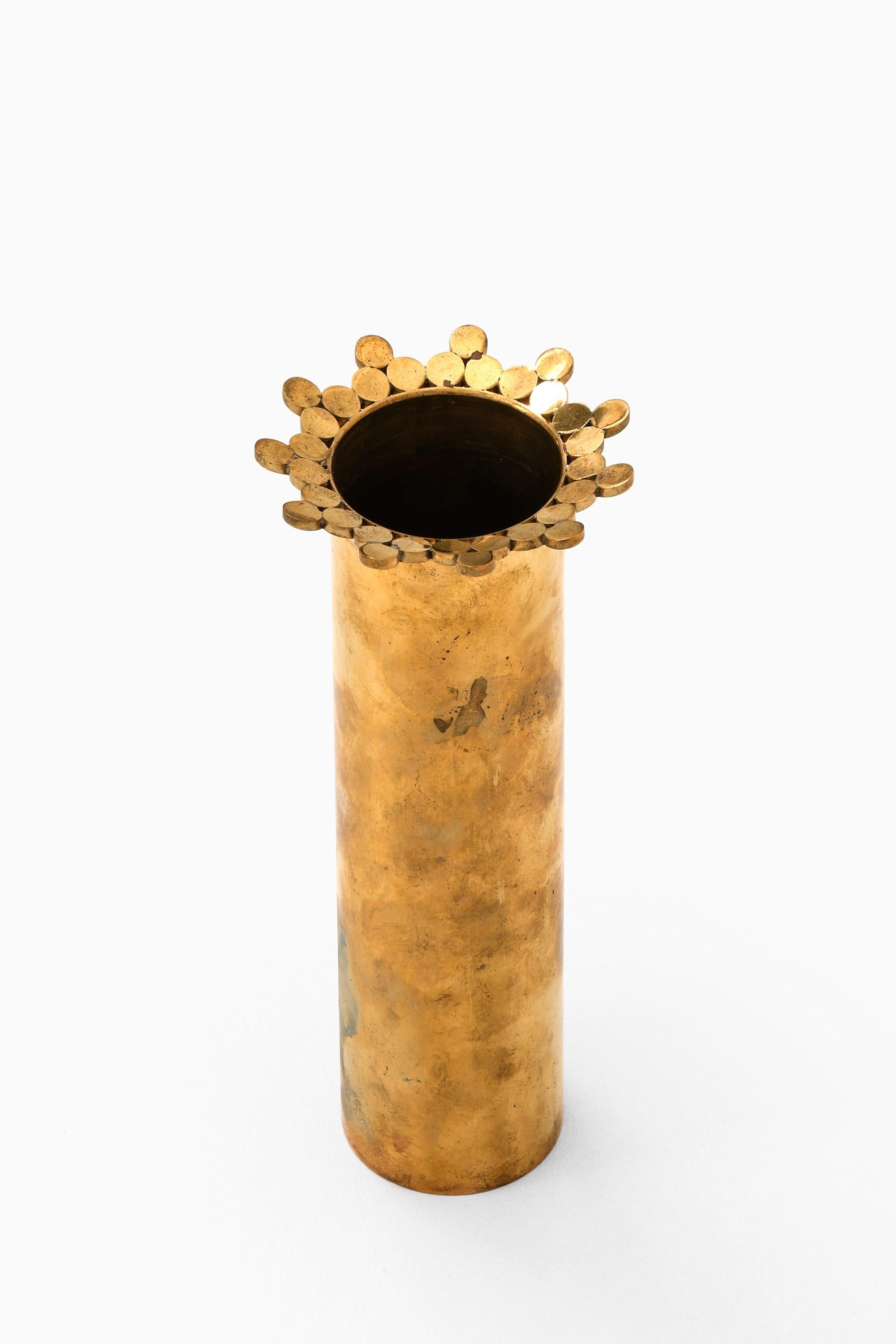 Brass Vase by Pierre Forsell, 1950's

Additional Information:
Material: Brass
Style: Mid century, Scandinavian
Produced by Skultuna in Sweden
Dimensions (W x D x H): 9.5 x 9.5 x 23 cm
