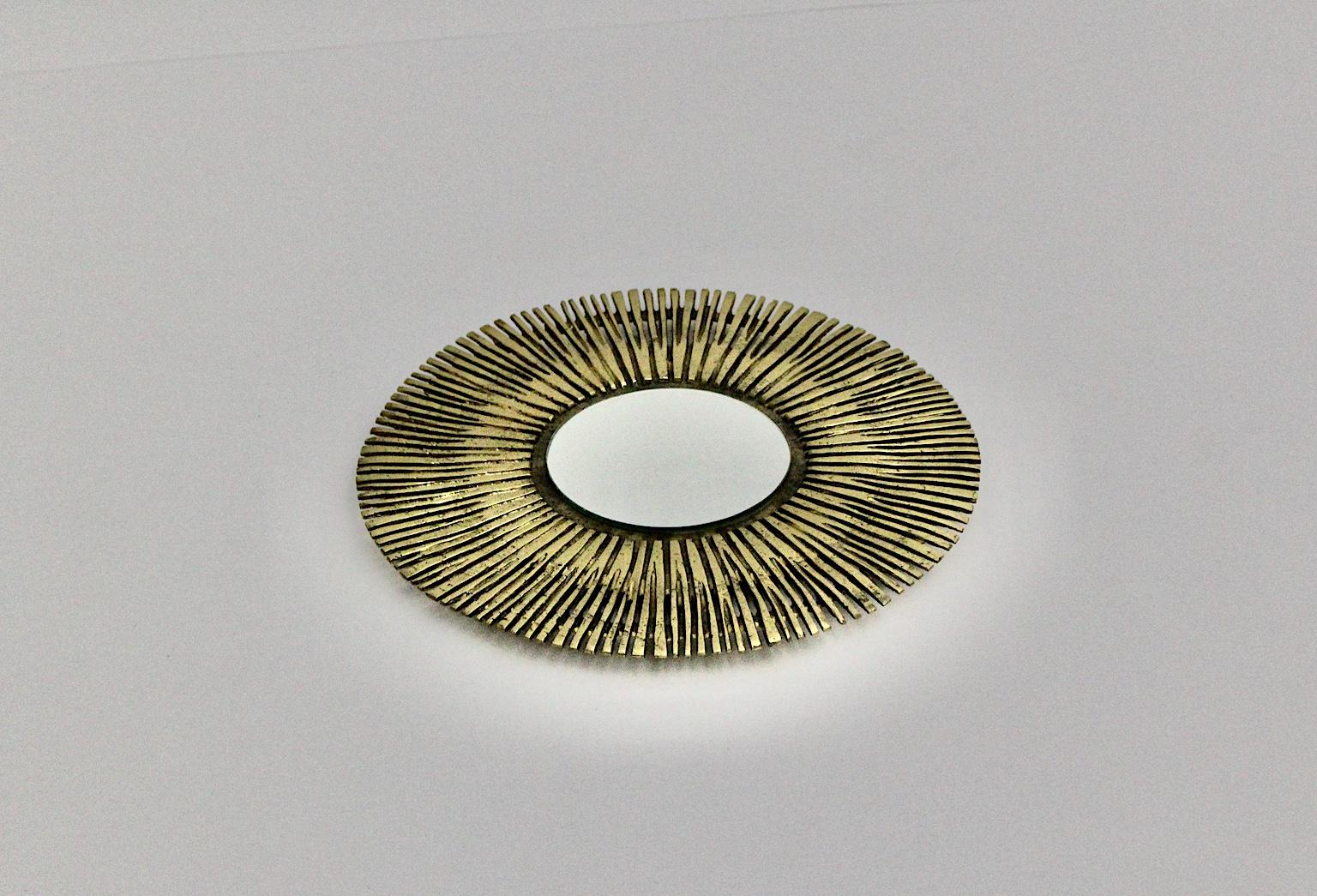 brass sunburst mirror