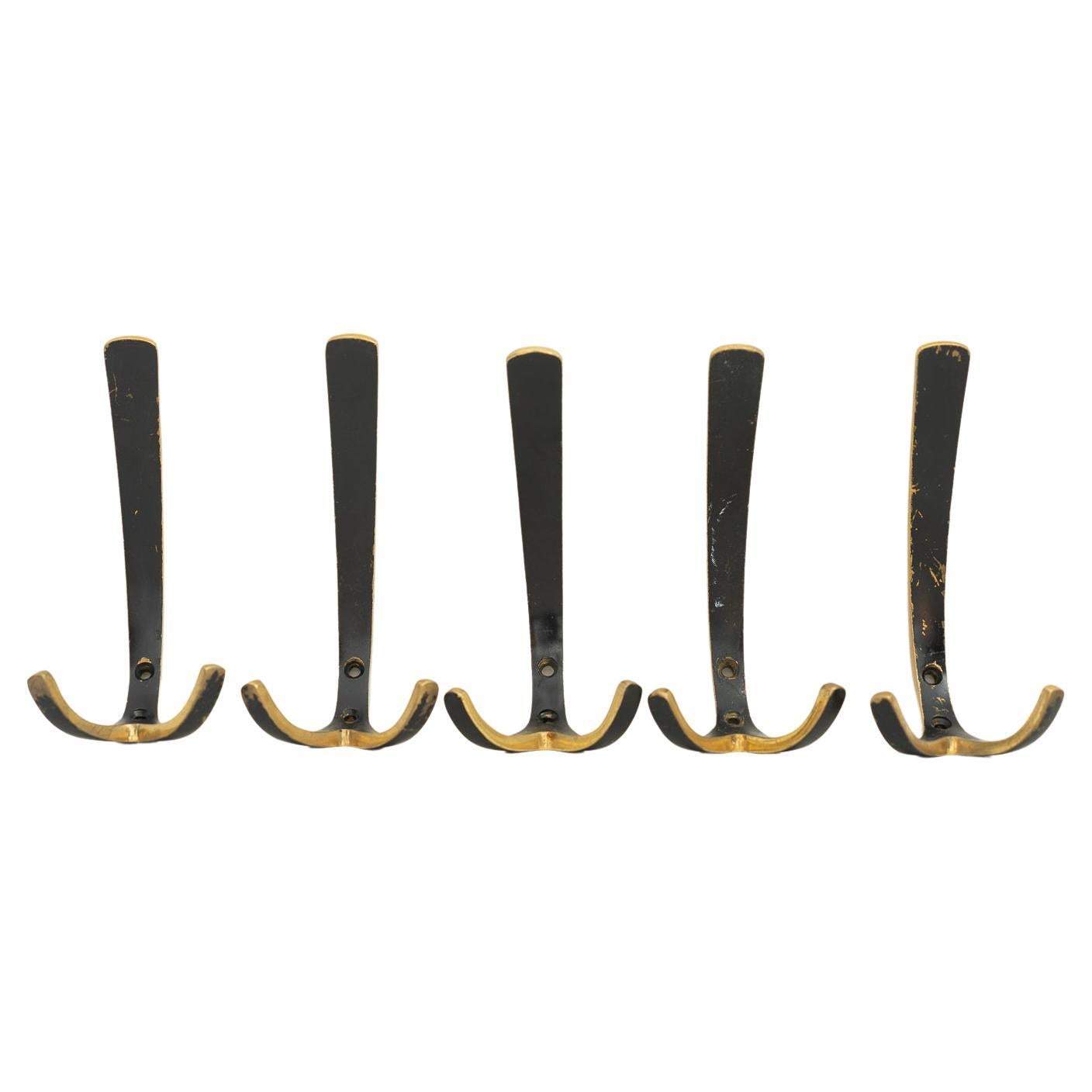 Twenty Brass Wall Hooks, 1950s at 1stDibs