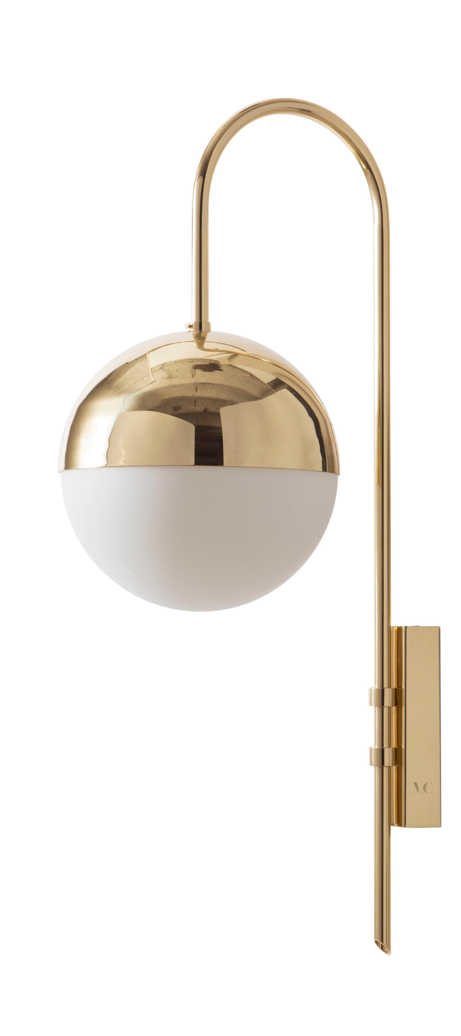 Brass wall lamp 01 by Magic Circus Editions
Dimensions: H 77 x W 25 x D 36.5 cm
Materials: Smooth brass, mouth blown glass

Available finishes: Brass, nickel
All our lamps can be wired according to each country. If sold to the USA it will be