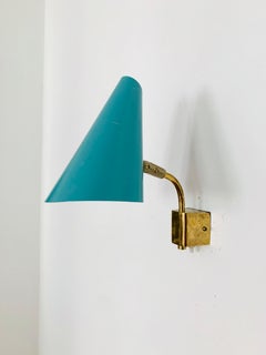 Lampe murale en laiton Erco