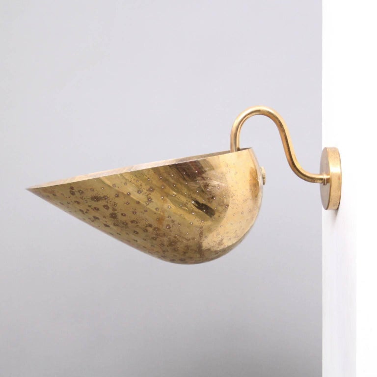 Mid-Century Modern Brass Wall Light with Perforated Shade by Carl-Axel Acking, Sweden, 1940s For Sale