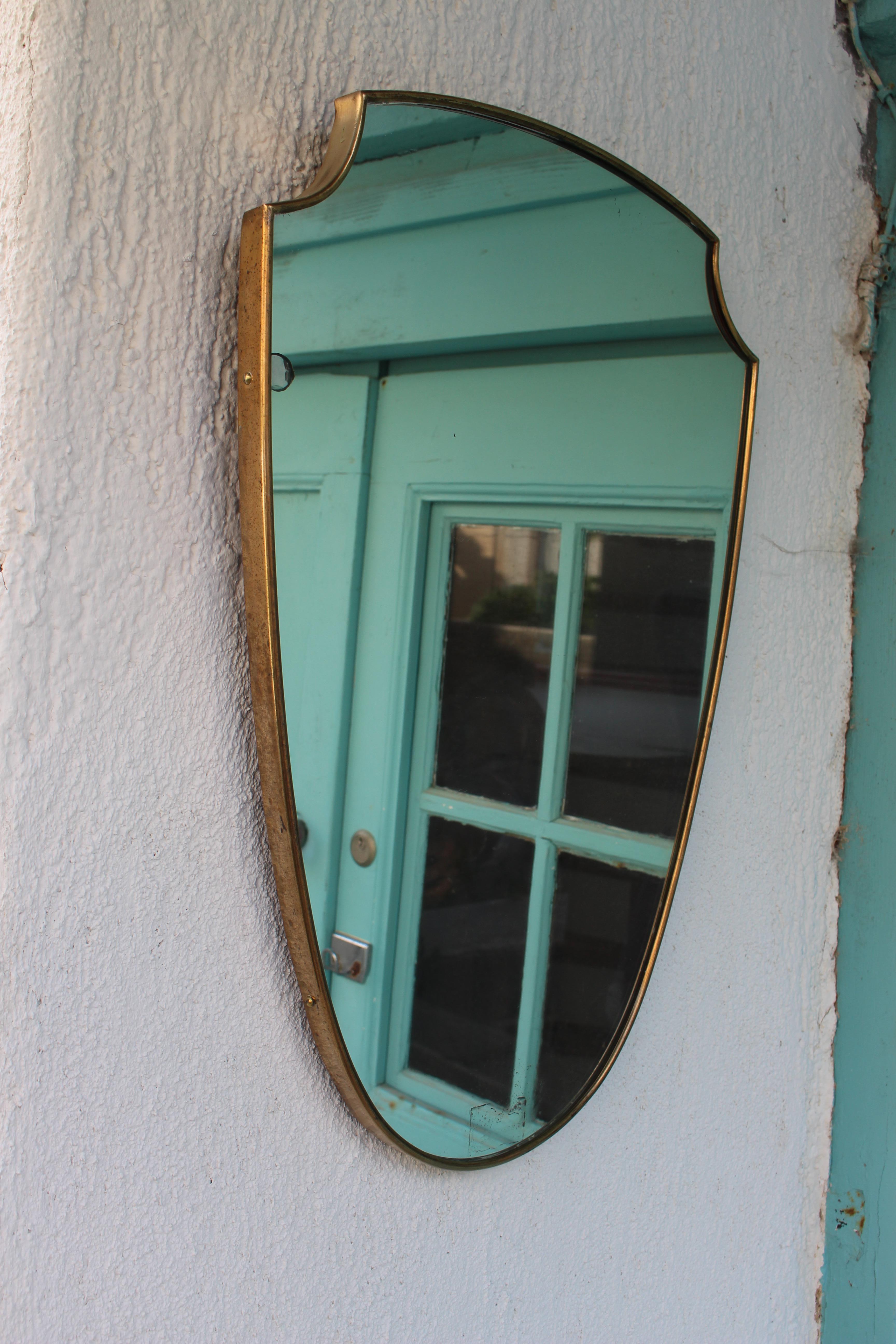 Italian mid century brass mirror.
 