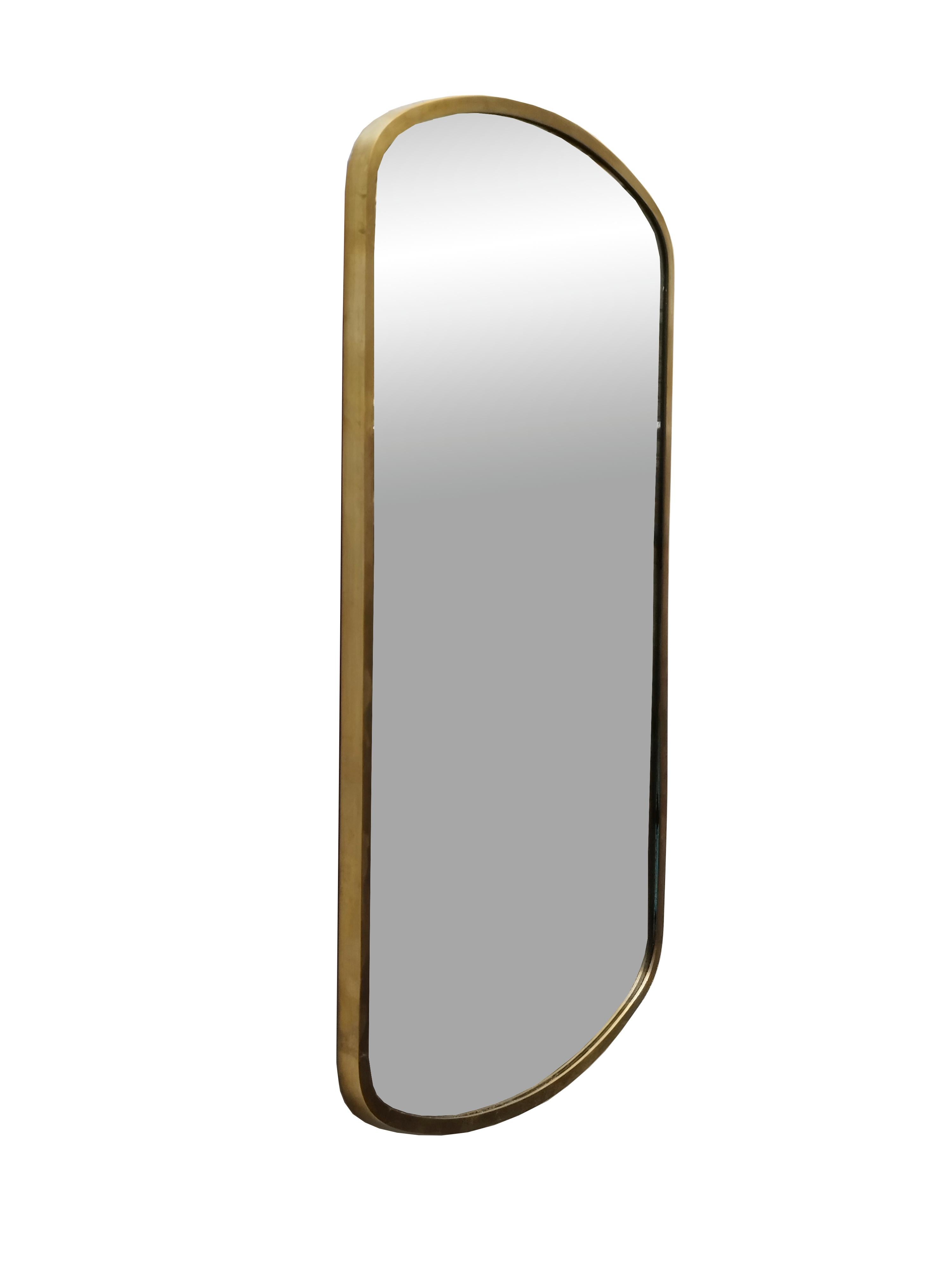 Gorgeous and elegant vintage wall mirror with solid brass frame and crystal mirror glass. 