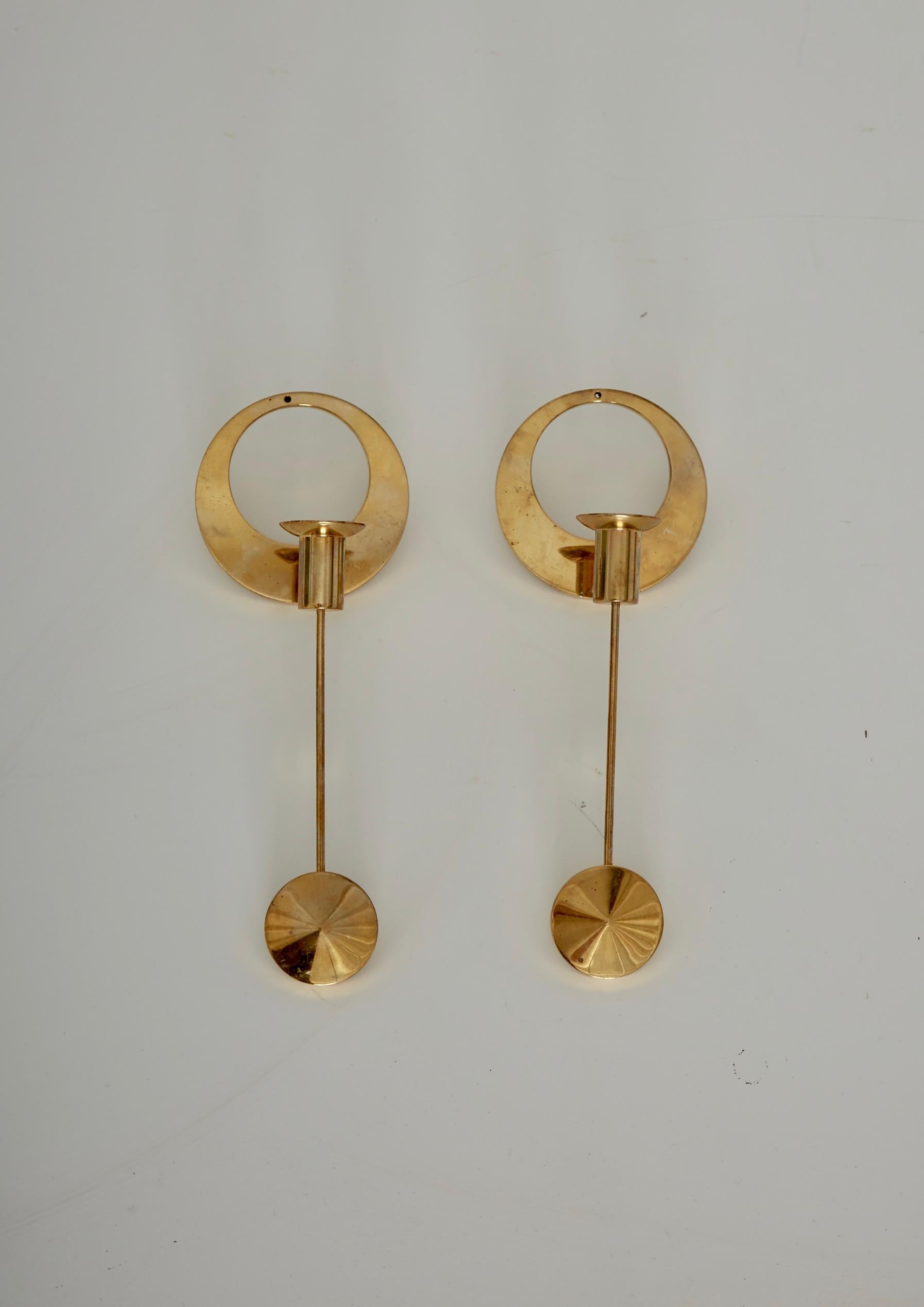 A pair of elegant midcentury brass wall-mounted candleholders, by Artur Pe Kolbäck. In good vintage condition with a nice natural patina. Stamped with makers mark. The price is for the pair. Free US shipping.
 
       
