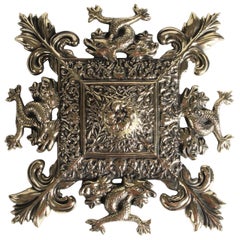 Brass Wall Plaque with Intertwined Sea Serpents and Fleur de Lys