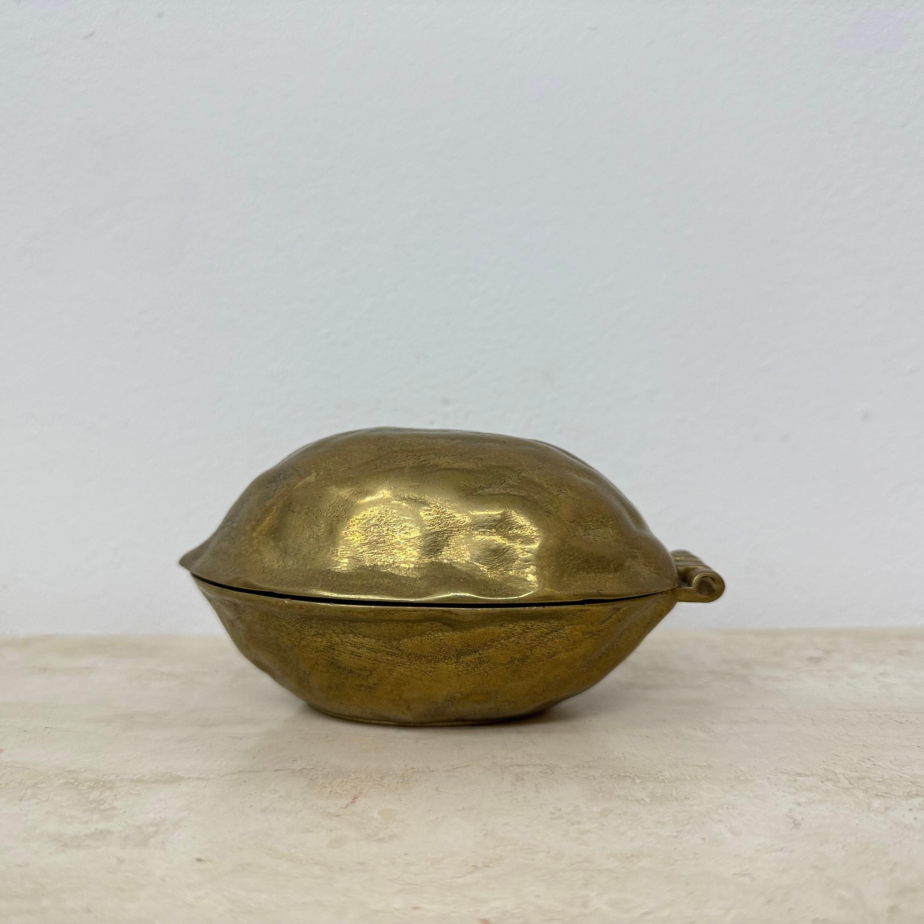 Mid-Century Modern Brass walnut shaped nut cracker , 1970’s For Sale