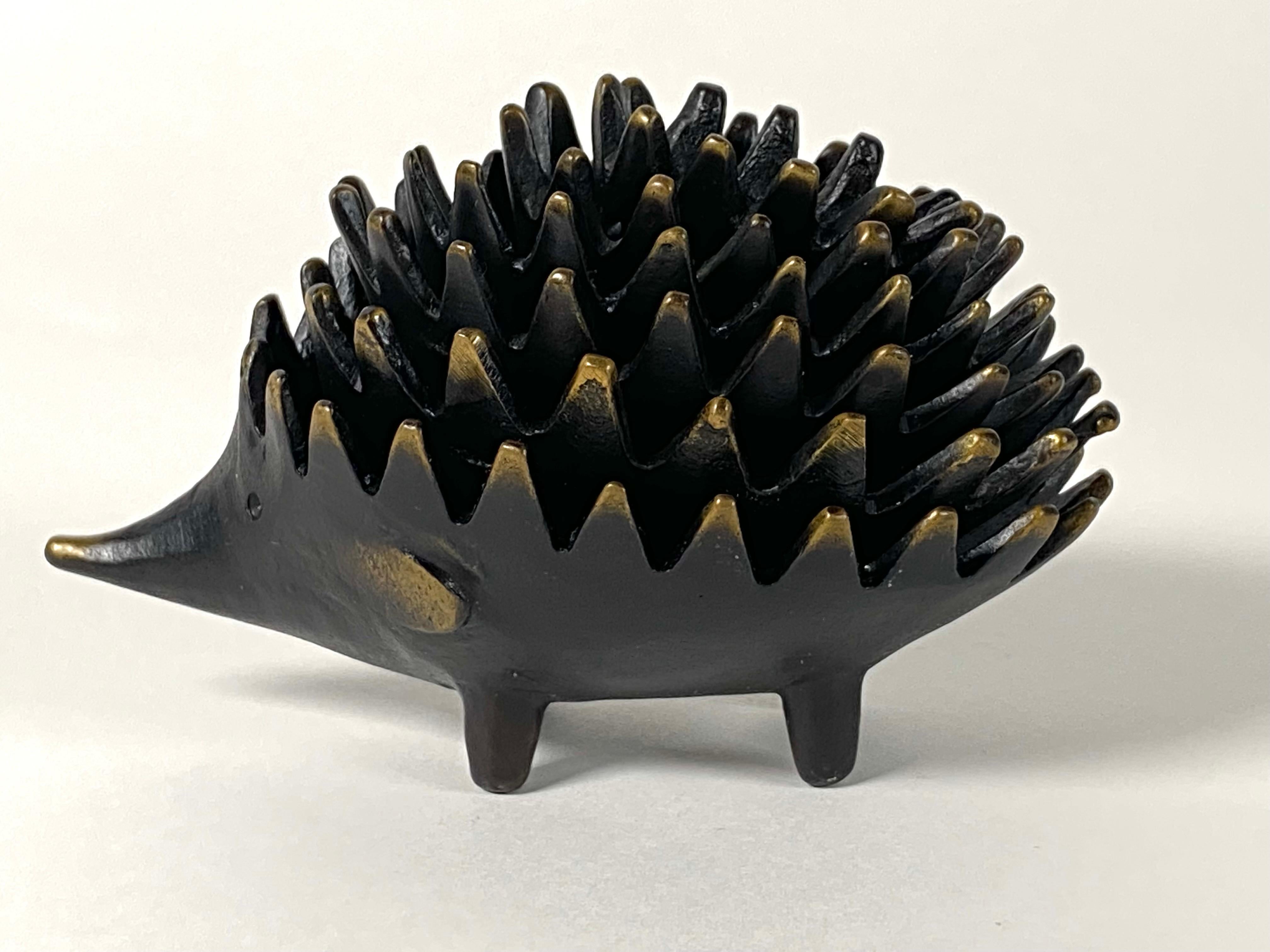 Brass stacking ashtrays in the form of a hedgehog designed by Walter Bosse of Austria circa 1950s. The hedgehog sculpture consists of 6 pieces 5 of which can be used as an ashtray, the spines alone the edges are designed to hold the cigarette.