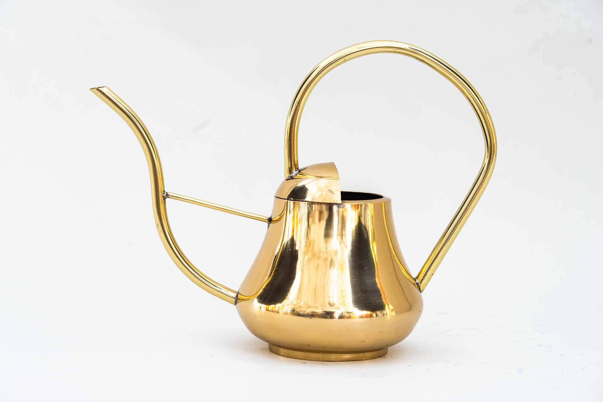 Brass watering can vienna around 1960s
Polished and stove enameled.