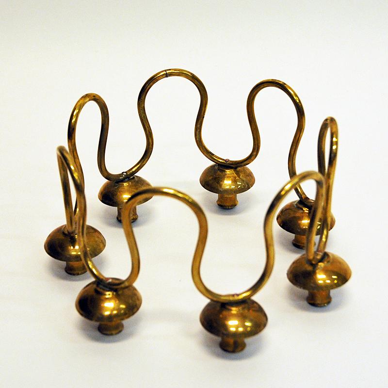 Scandinavian Modern Brass Wave Shaped Candleholder by Lars Holmström for Svensk Tenn 1950s, Sweden