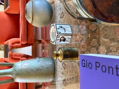 Brass table lighter shaped like a weight, Mauro Manetti, Italy, 1970