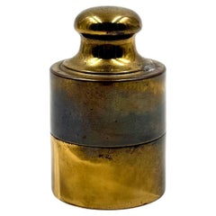 Brass table lighter shaped like a weight, Mauro Manetti, Italy, 1970