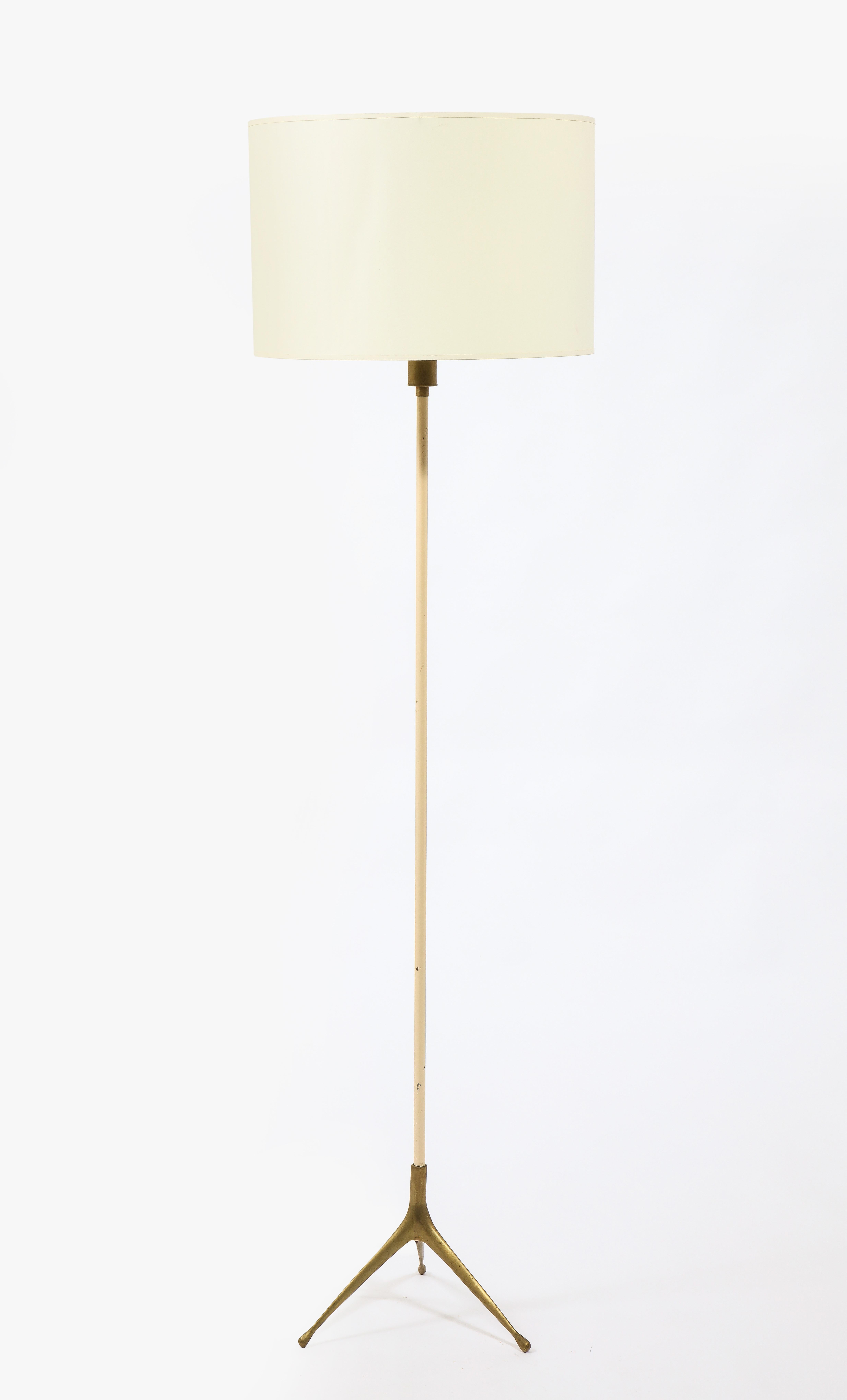 Minimalist brass and white enameled metal floor lamp. 

Shade not included.