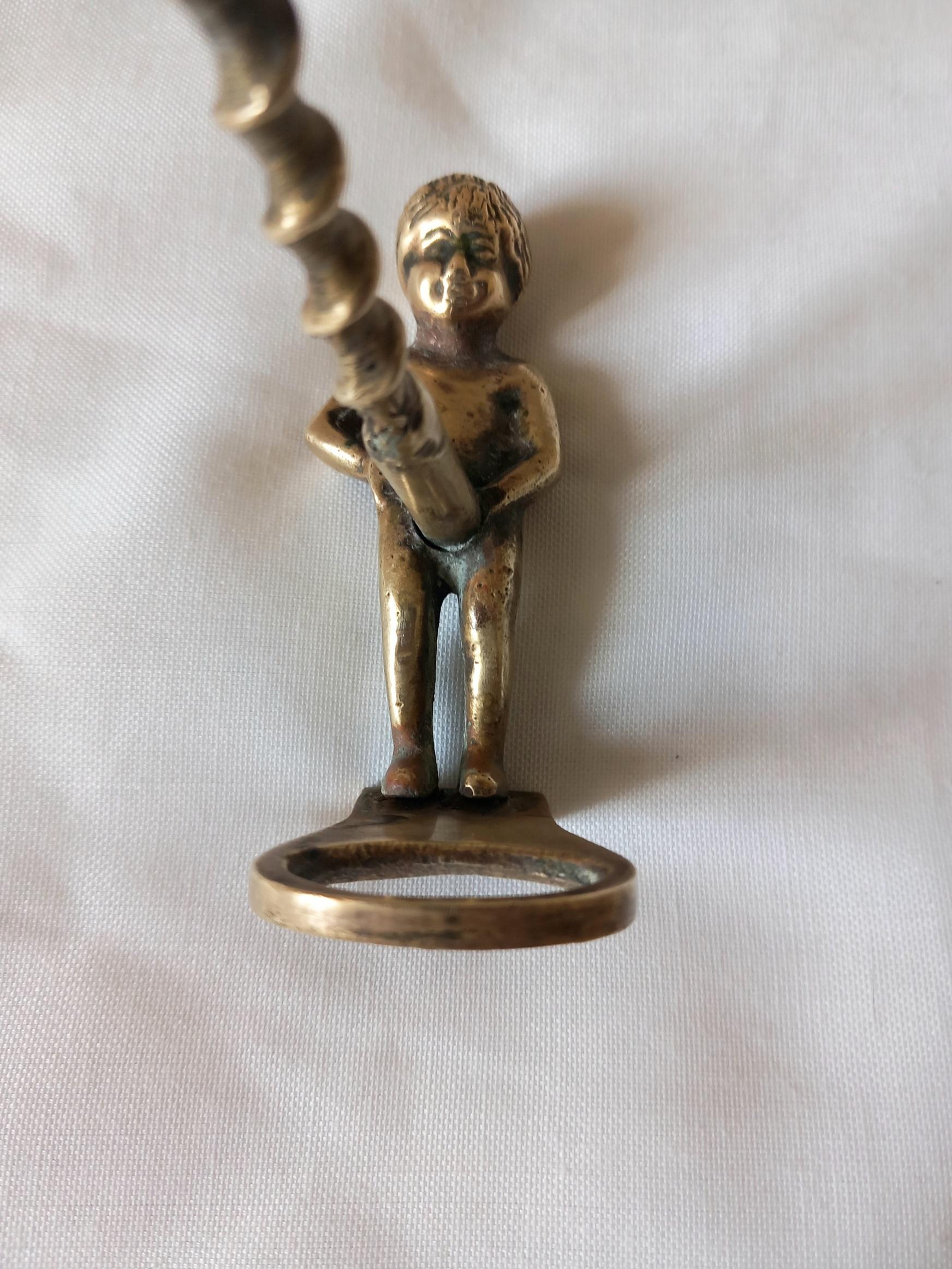 Spanish Brass Wine and Bottle CAP Opener Putto For Sale