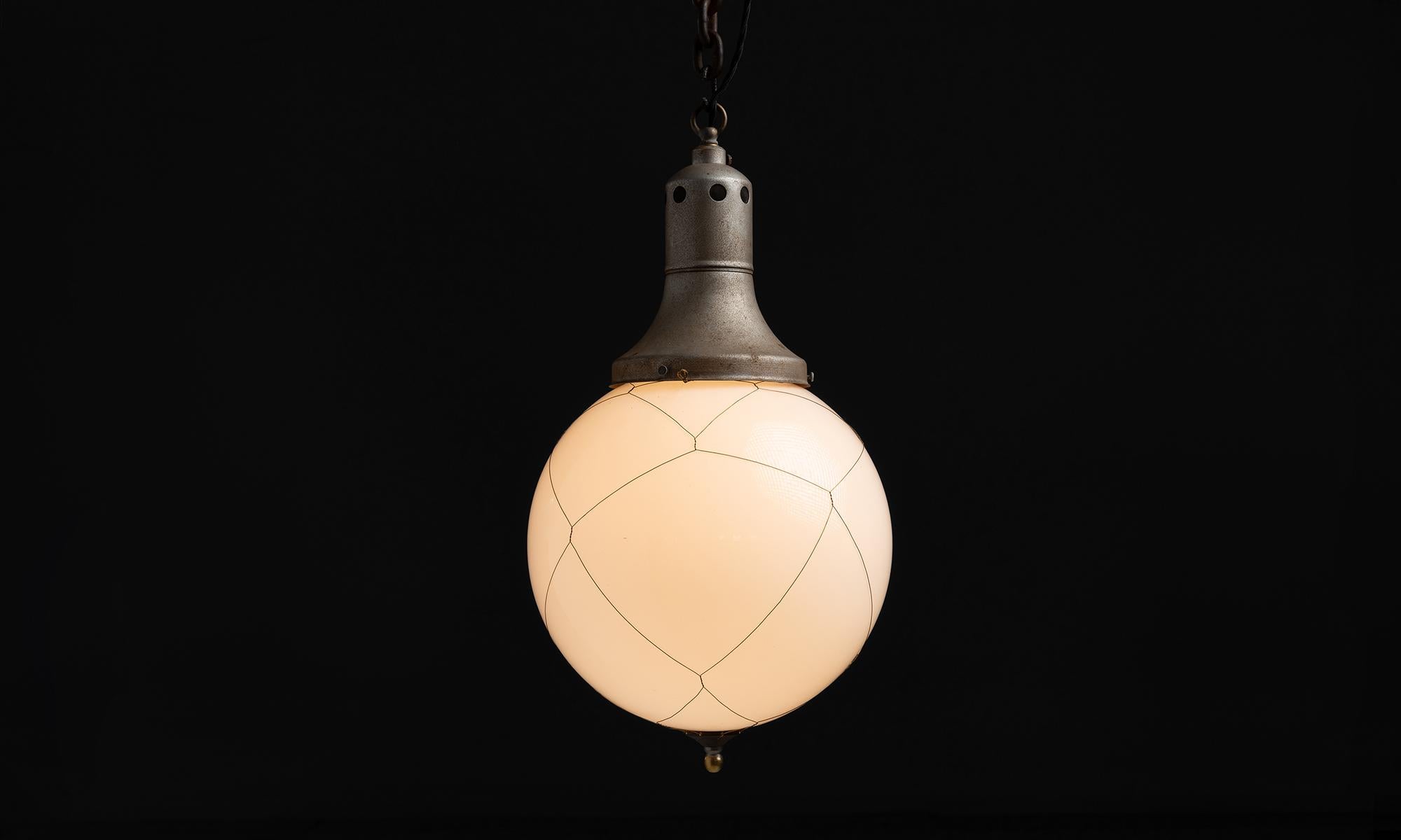 England circa 1920
Wrapped in brass wire cage, with opaline milk glass shades.
12”dia x 23”h