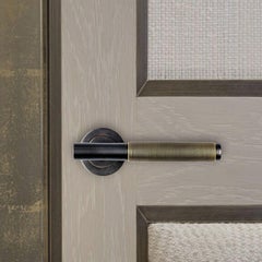 Brass door handle with gunmetal and antique gold finish