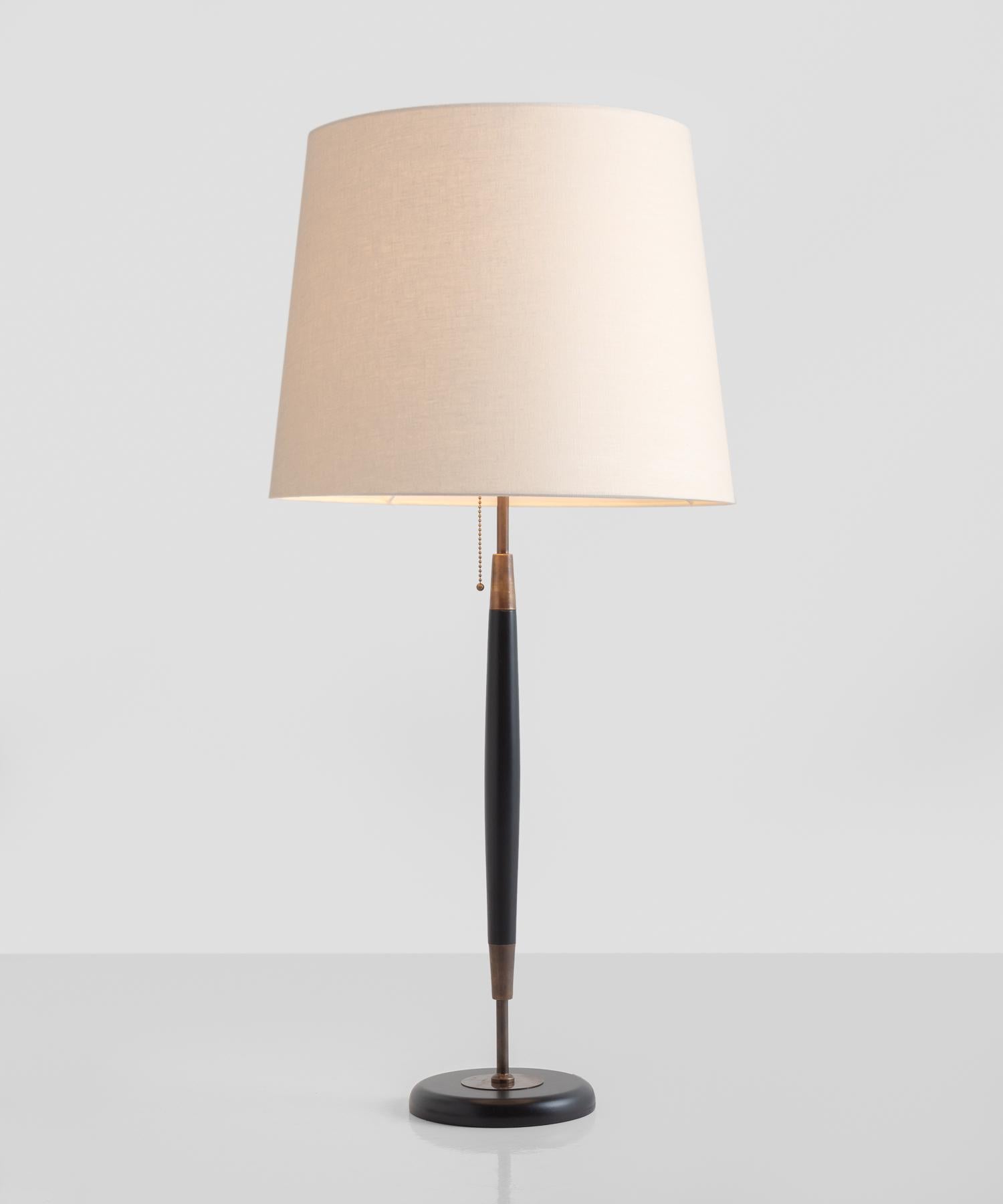 Wood base and stand with brass hardware and linen shade.

Made in Italy

*Please Note: This fixture is made to order in Italy, and comes newly wired (eu wiring). It is not UL Listed. Standard Lead Time is 4-6 Weeks. We do not offer rewiring / UL