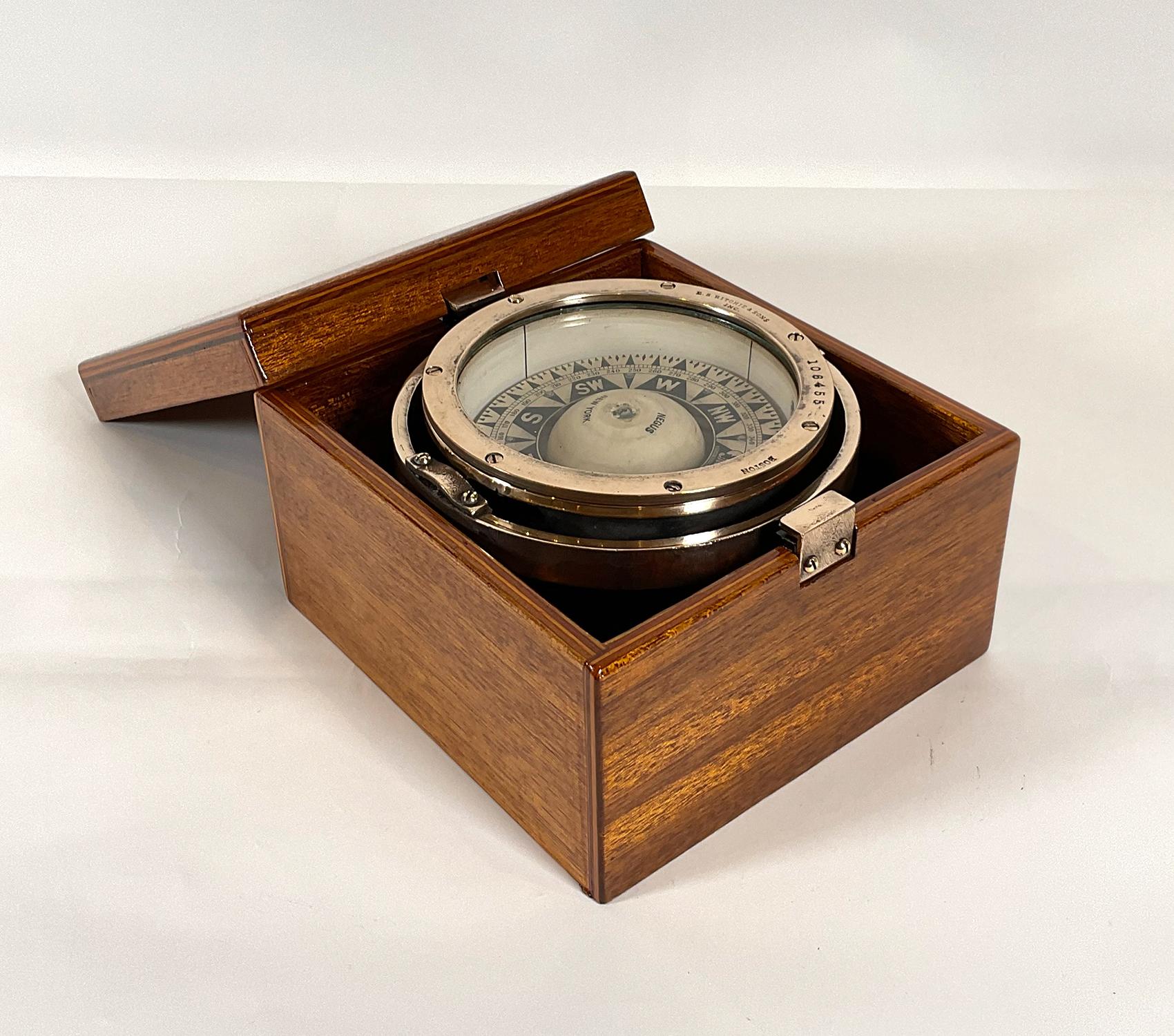 Highly polished Gimballed boat compass by E.S. Ritchie & Sons, Boston Mass. With compass card bearing name of ships chandler Negus of New York. The mahogany box has a fresh coat of varnish. Choice maritime relic.

Weight: 7 LBS
Overall