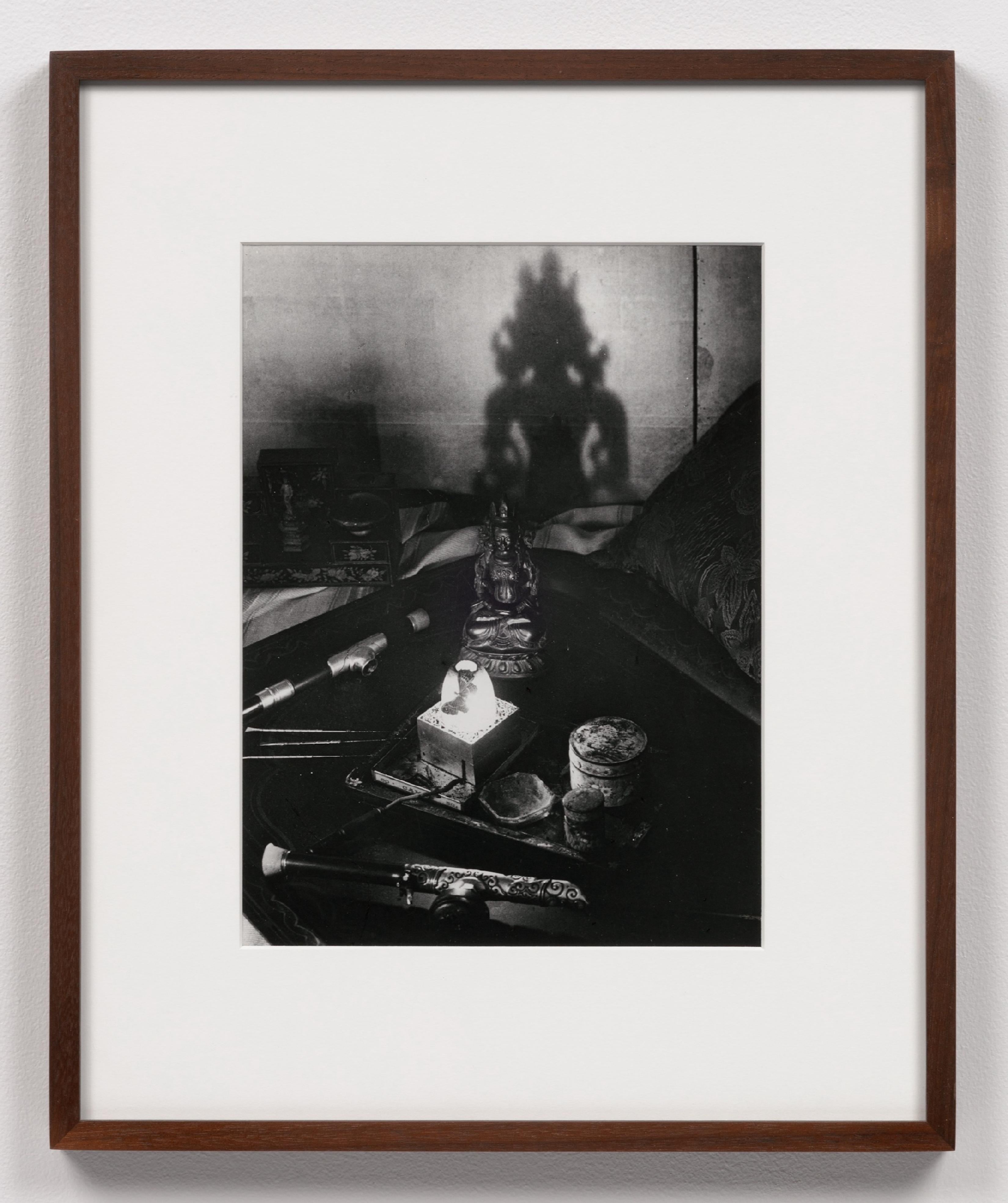 Brassaï Black and White Photograph - Nature morte, une fumerie d’opium, avenue Bosquet, le plateau avec les pipes...