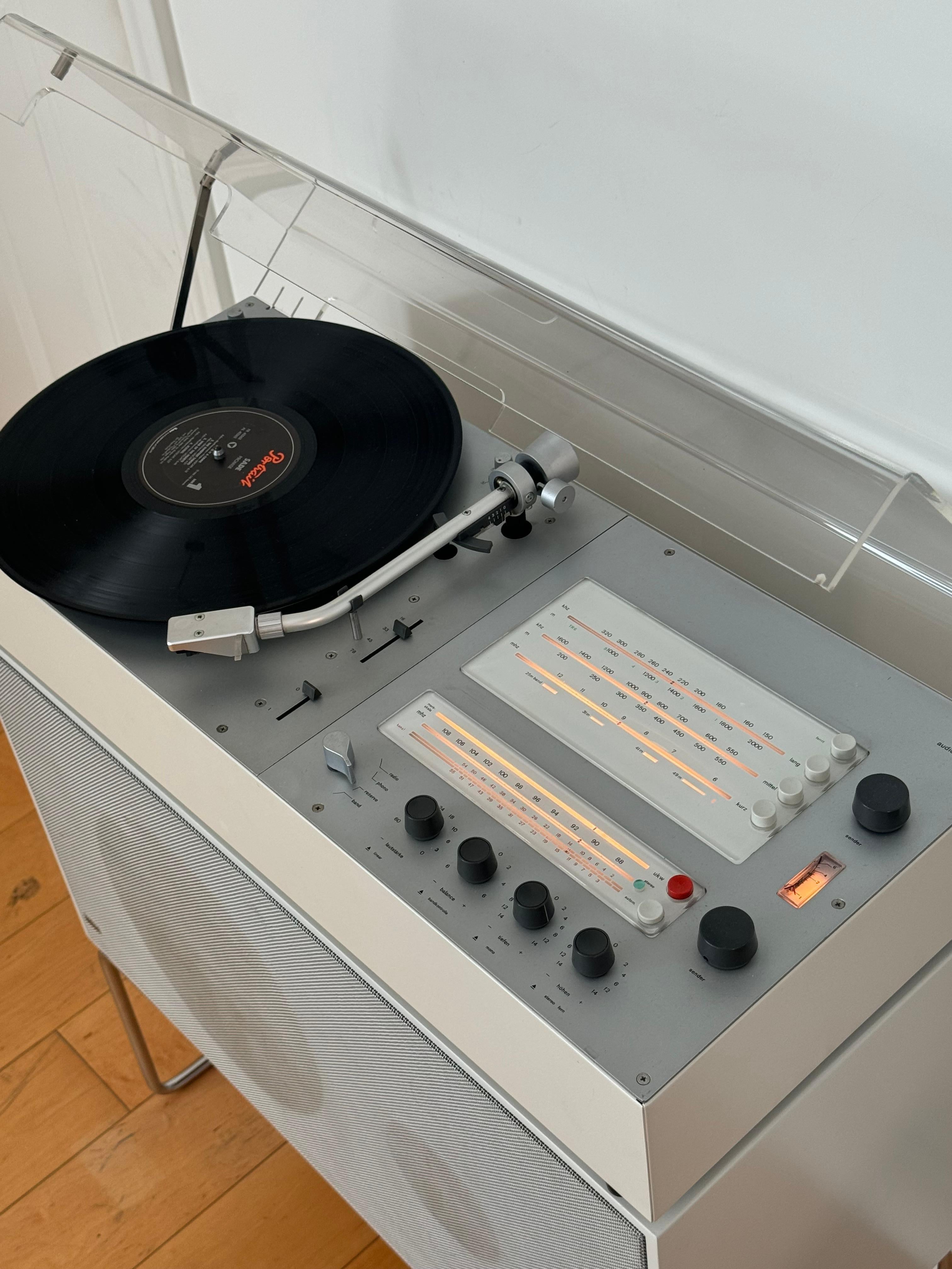 Braun Audio 300 and L60 floor speaker designed by Dieter Rams, 1960's/70's. Equip with AM/FM radio and record player. Fully functional and has been serviced by a technician.
