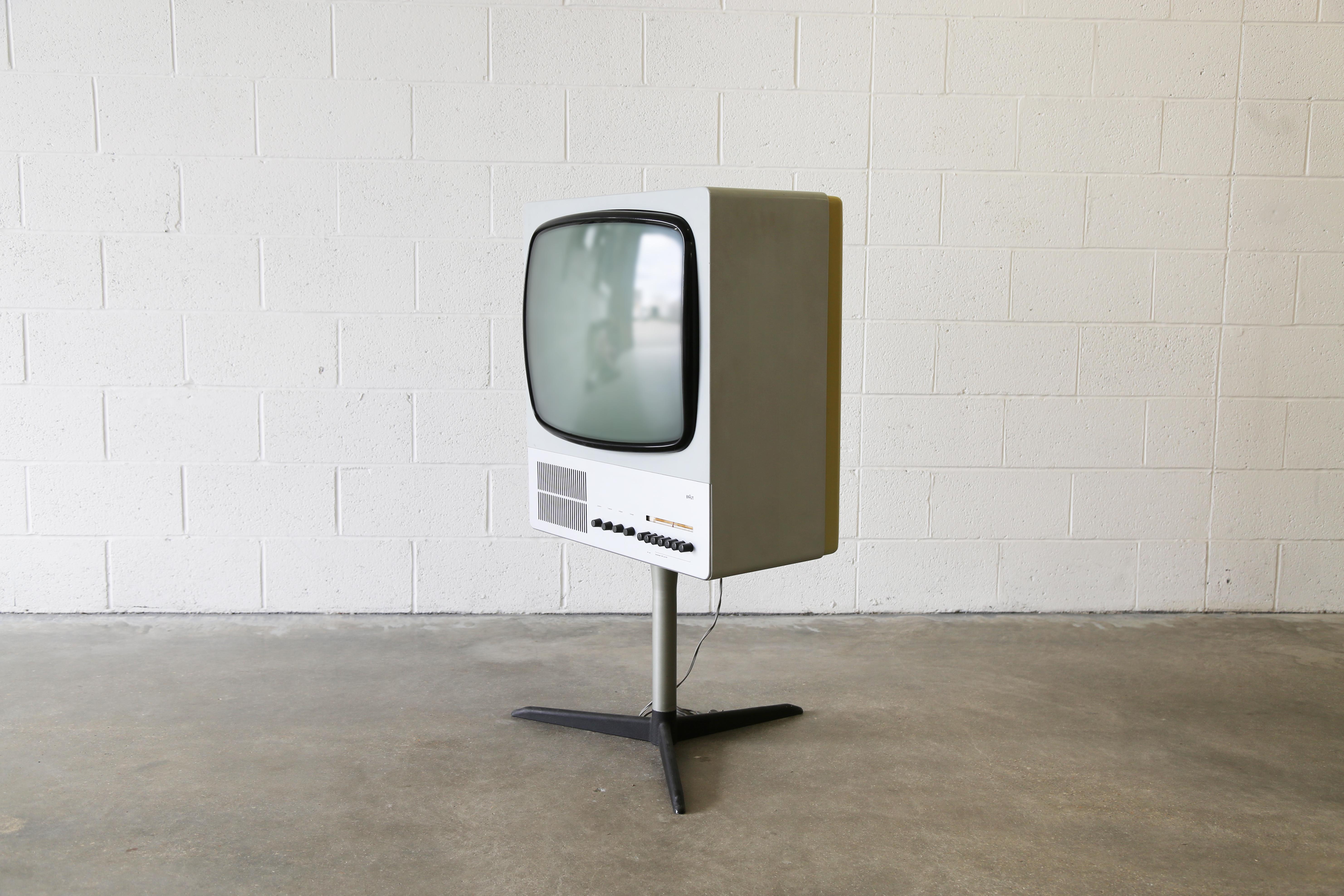 Braun FS-80 Television designed by Dieter Rams ca. 1964 in plastic, glass, and powder coated steel. A rare offering, these televisions rarely surface. Recently seen in the Apple TV and prime video series “Severance”. The television sits on a swivel