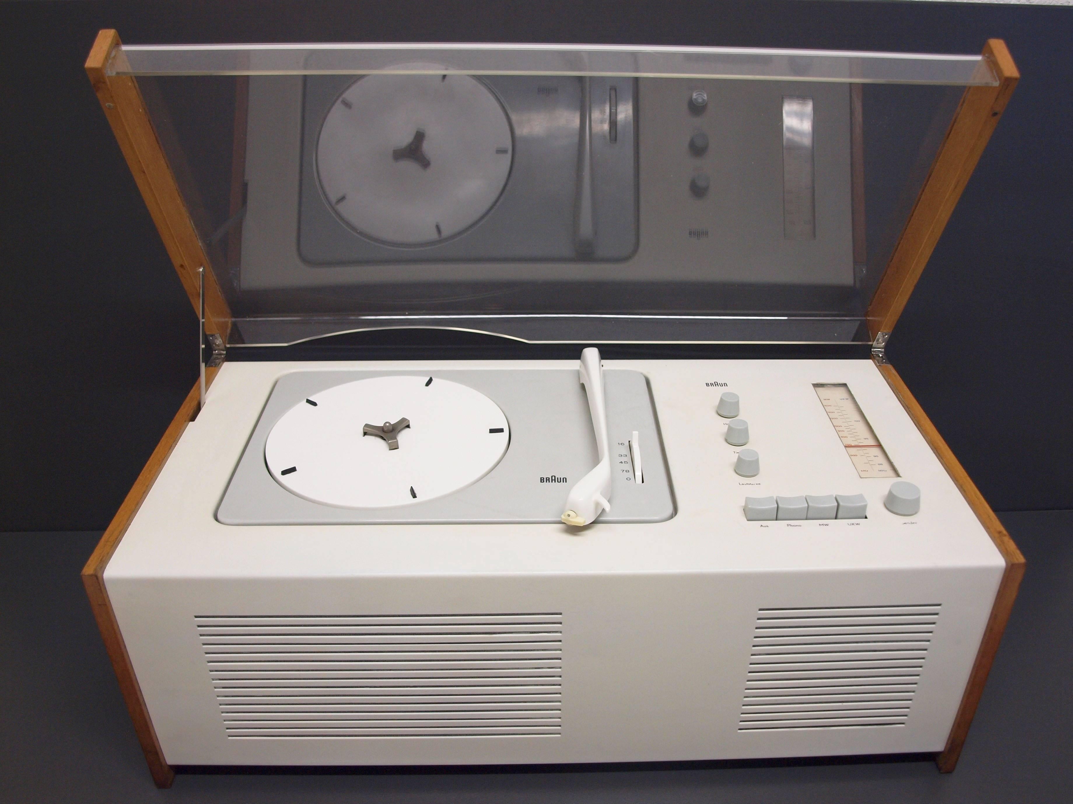 Steel frame painted with wooden backsides and plexiglass cover (Nicknamed Snow White's Coffin). Designed by Hans Hugelot, Dieter Rams and Wilhelm Wagenfeld (record player) for Braun AB in 1956 as the 