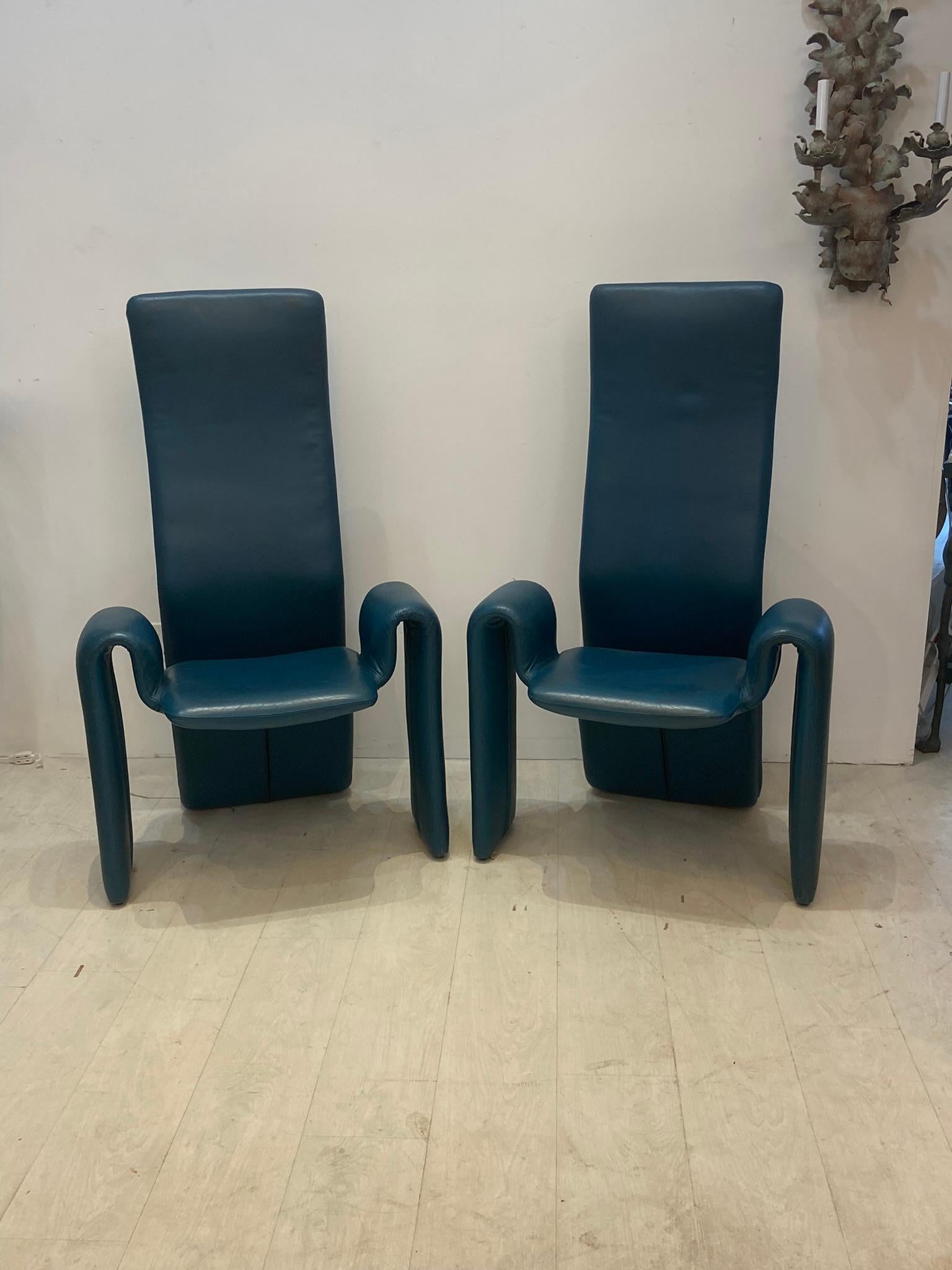 Pair of dining room arm chairs could be used as lounge chairs or side chairs. These chairs were designed by Steve Leonard for Brayton International in the 1970s. In very good condition show very little wear from a well kept estate.