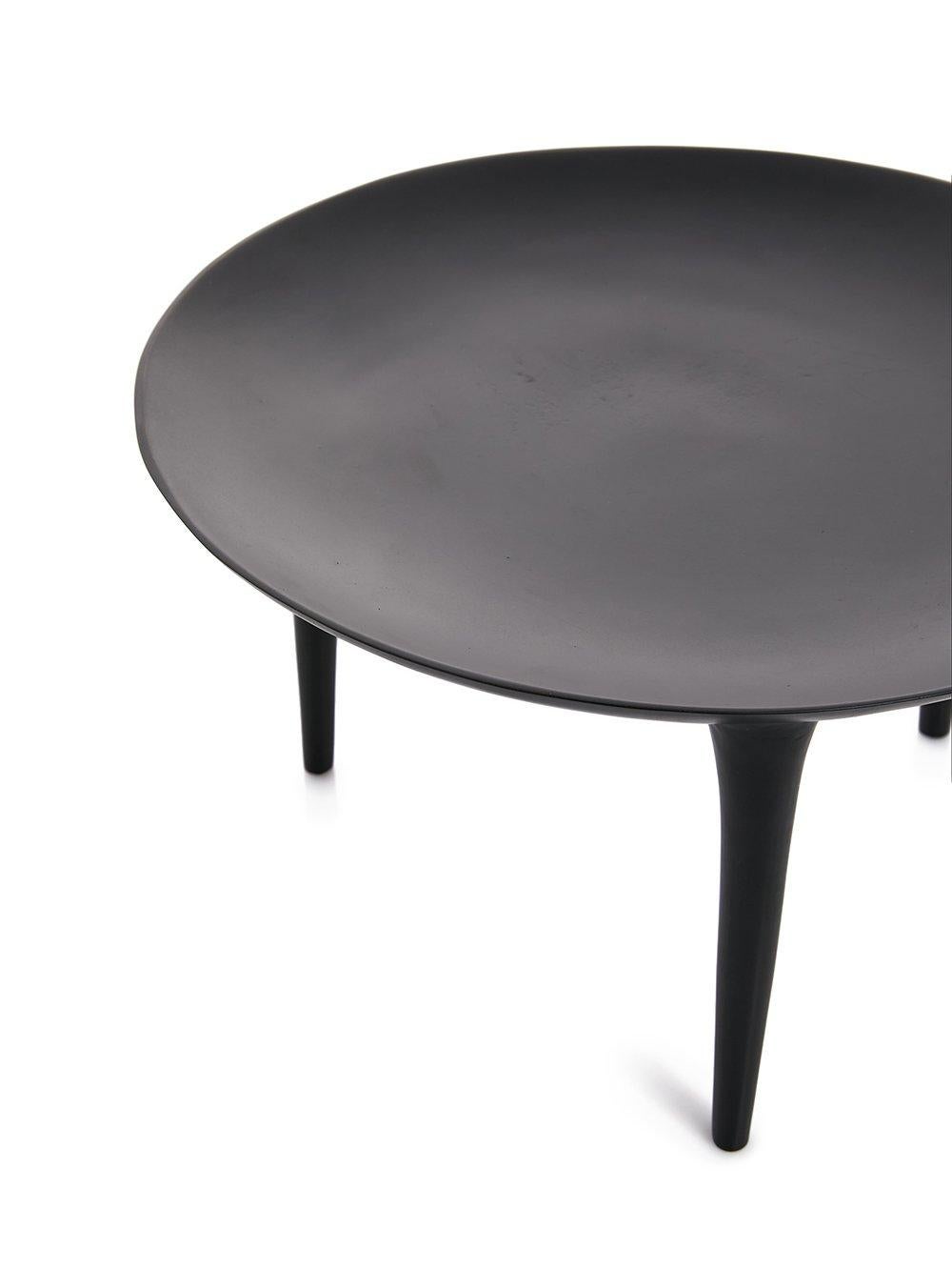 Rick Owens Brazier in Black Bronze.
Three-legged table with polished surface.