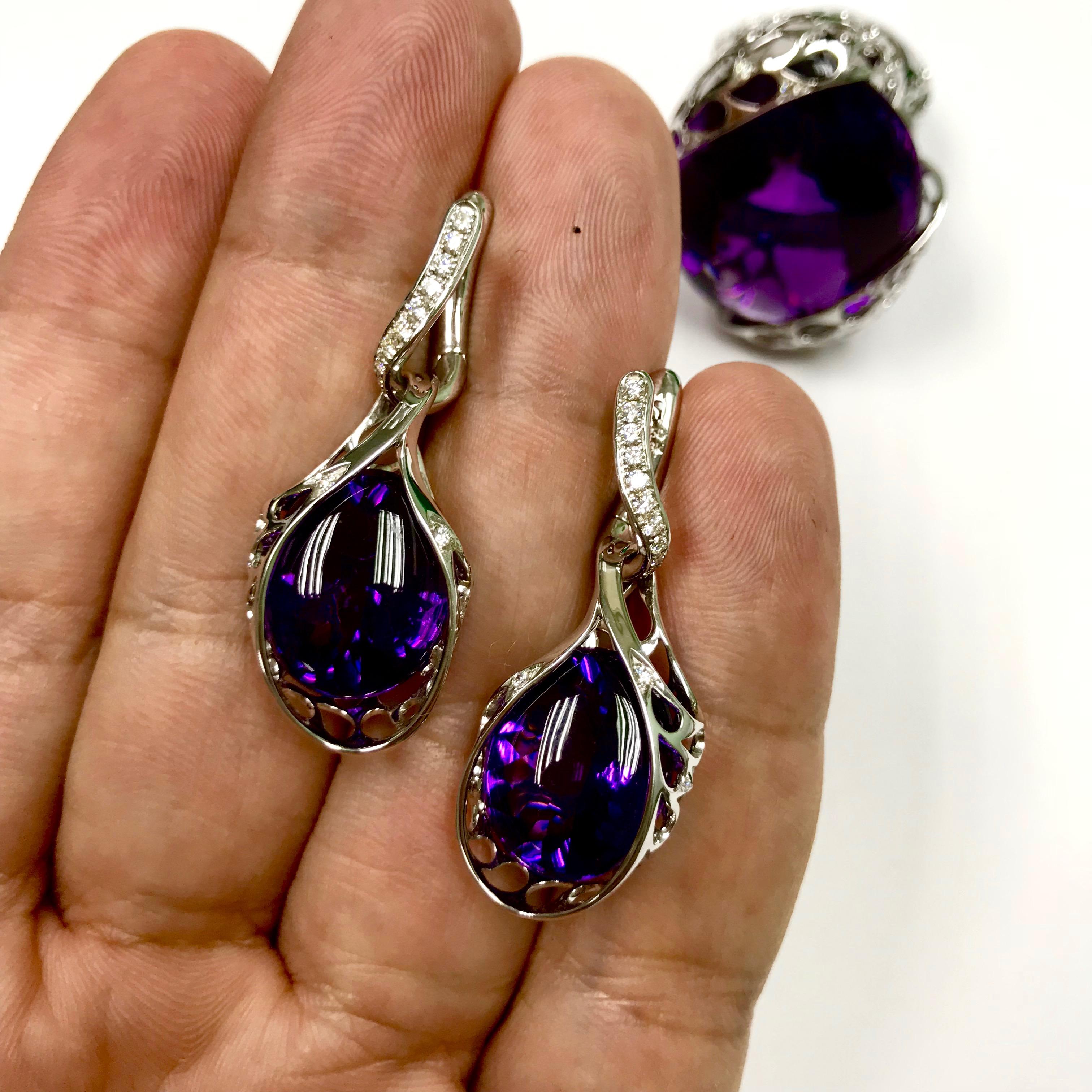 Pair of Brazilian Amethyst 19.9 carat, Diamond 0.38 carat. 18 Karat White Gold Earrings.
Can be wear without dangling part (day/night)
Available in set with the ring LU116414714331

16x40x10.2 mm
13.81 gm
