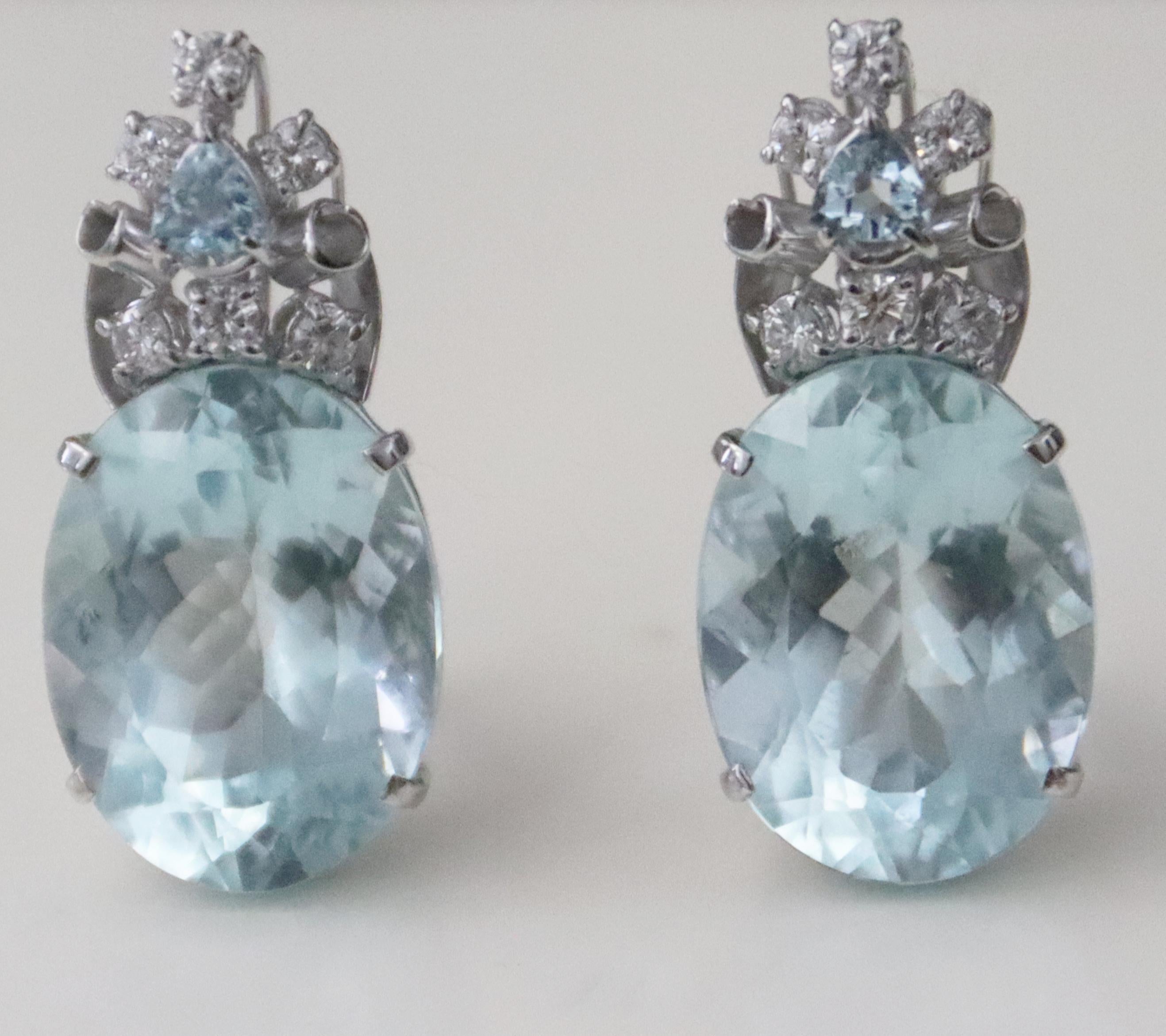 18 karat white gold stud earrings. Handmade by our craftsmen and assembled with Brazilian aquamarine and diamonds

Earrings total weight 18.40 grams
Aquamarine weight 16.50 karat
Diamonds weight 0.41 karat

