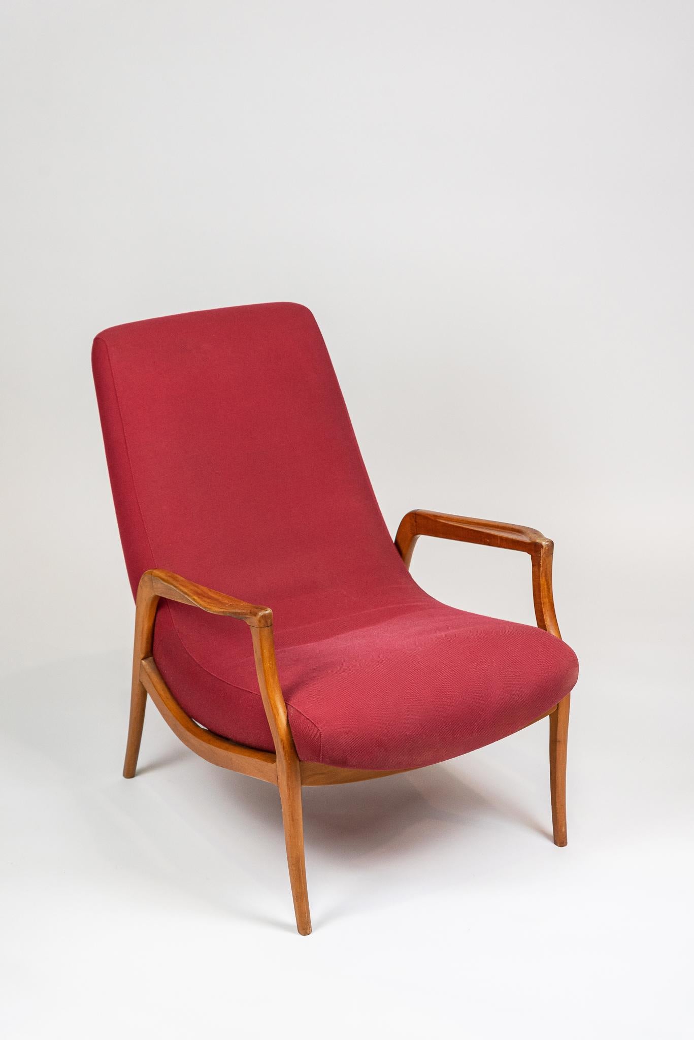Armchair, 1960's in Caviuna and cotton.

Gelli armchair in solid wood 
