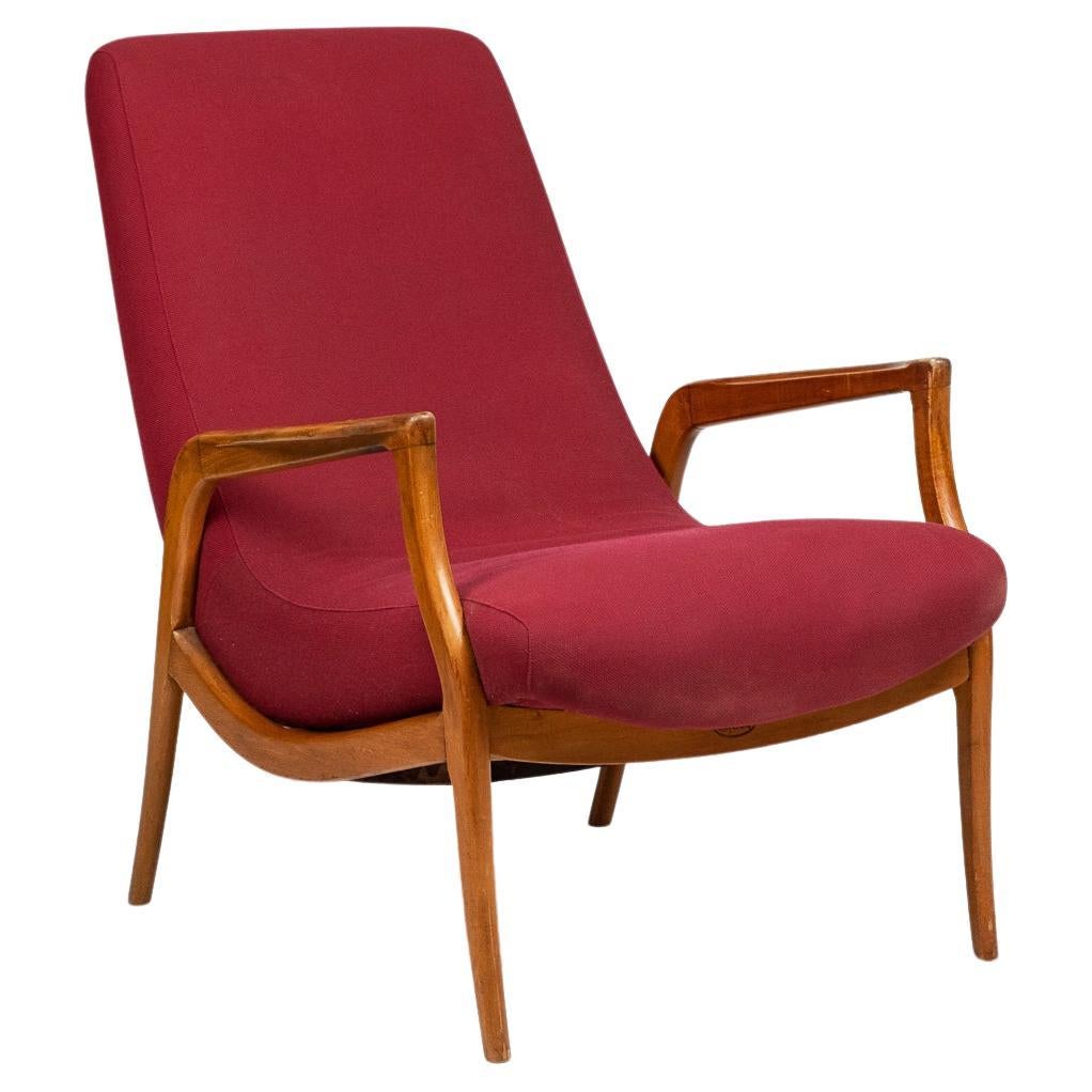 Fauteuil brésilien. Fabriqué par Moveis Gelli, en bois de Caviuna. Années 1960