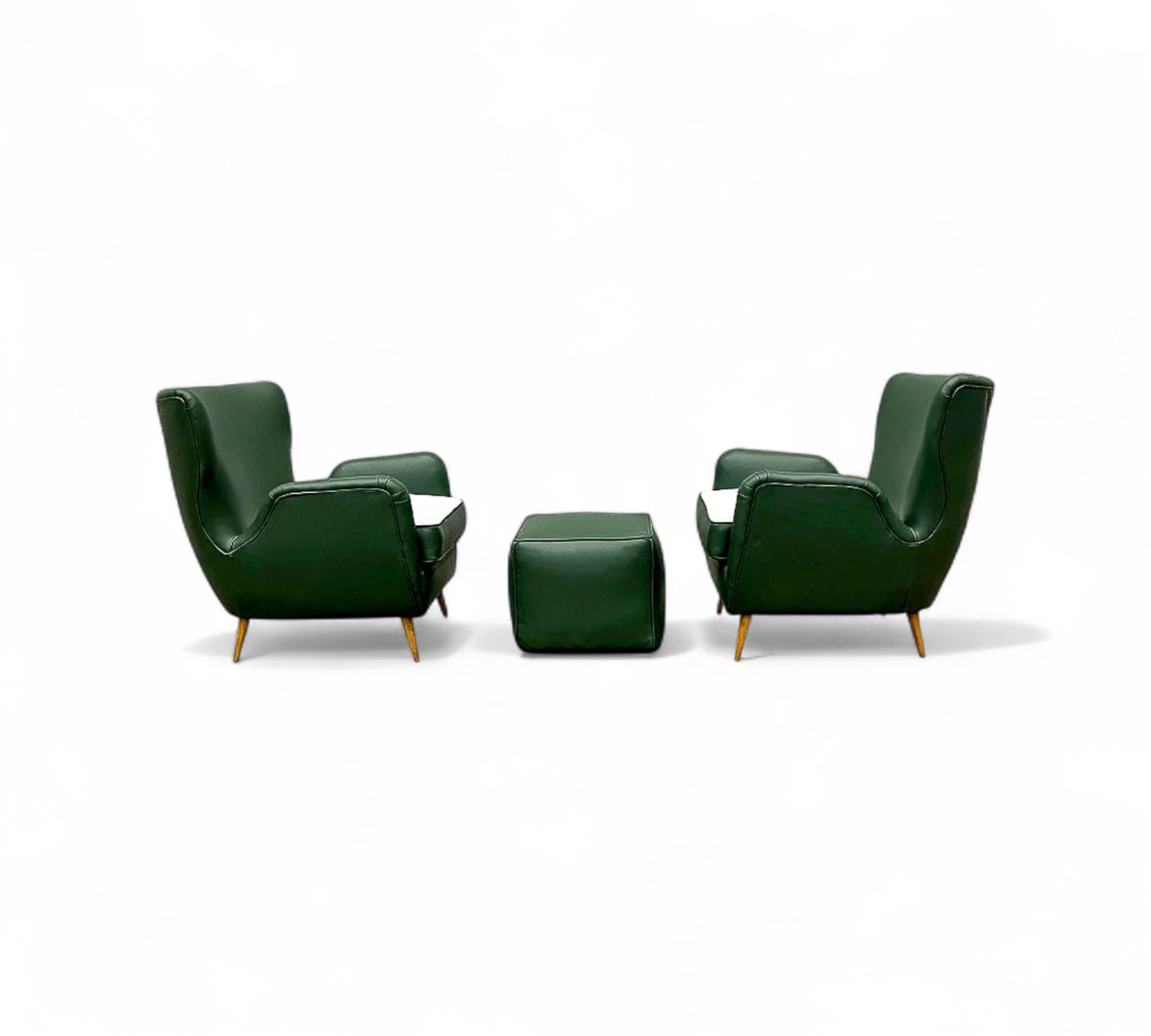 Available today, with domestic shipping in the NYC metro area included, these Brazilian Mid-Century Armchairs with Pouf in Hardwood, Leather and Fabric, Carlo Hauner, c. 1950s, is nothing less than gorgeous! 

This set of armchairs with a matching