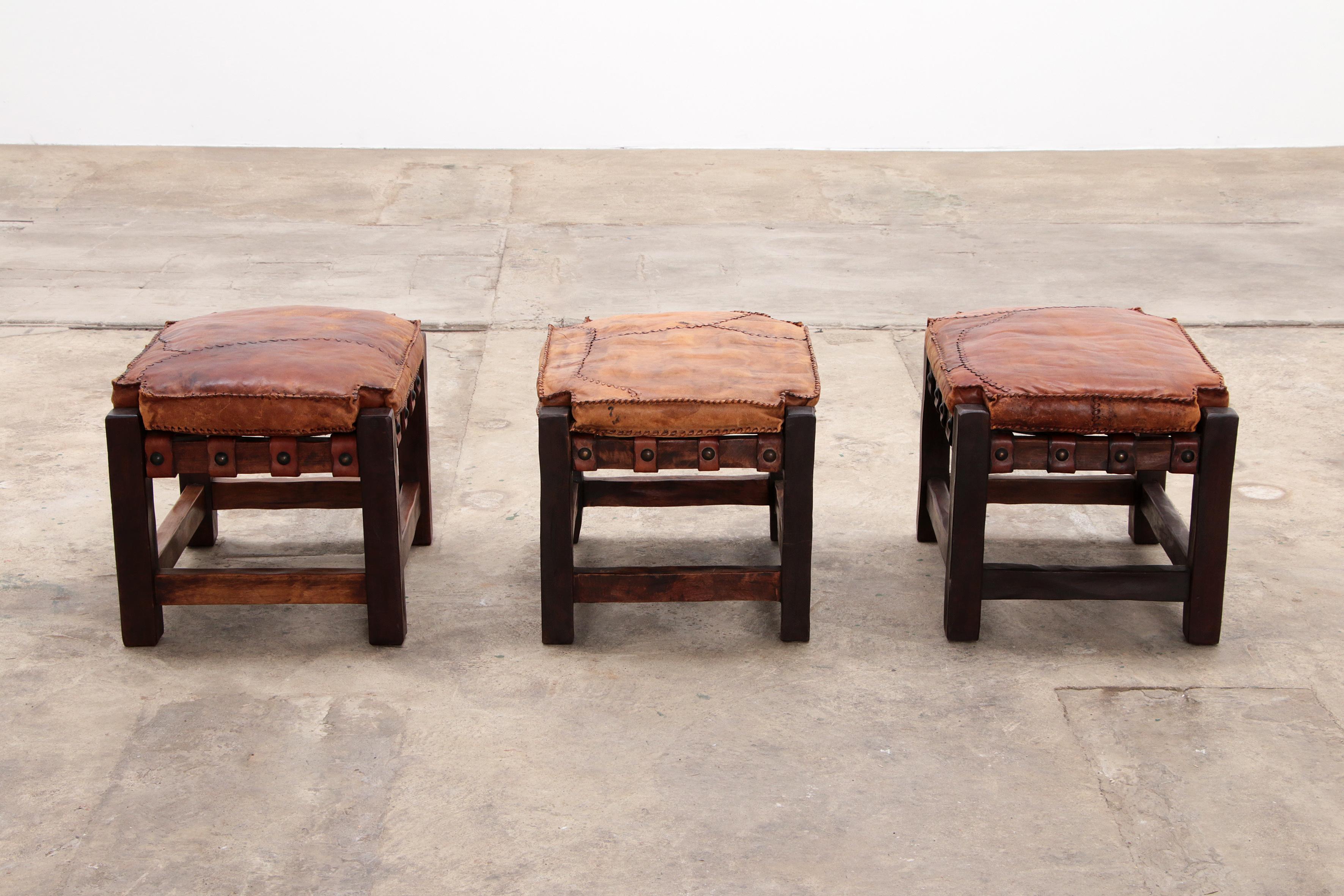 Leather Brazilian Brutalist footstools with patchwork leather, 1960 For Sale