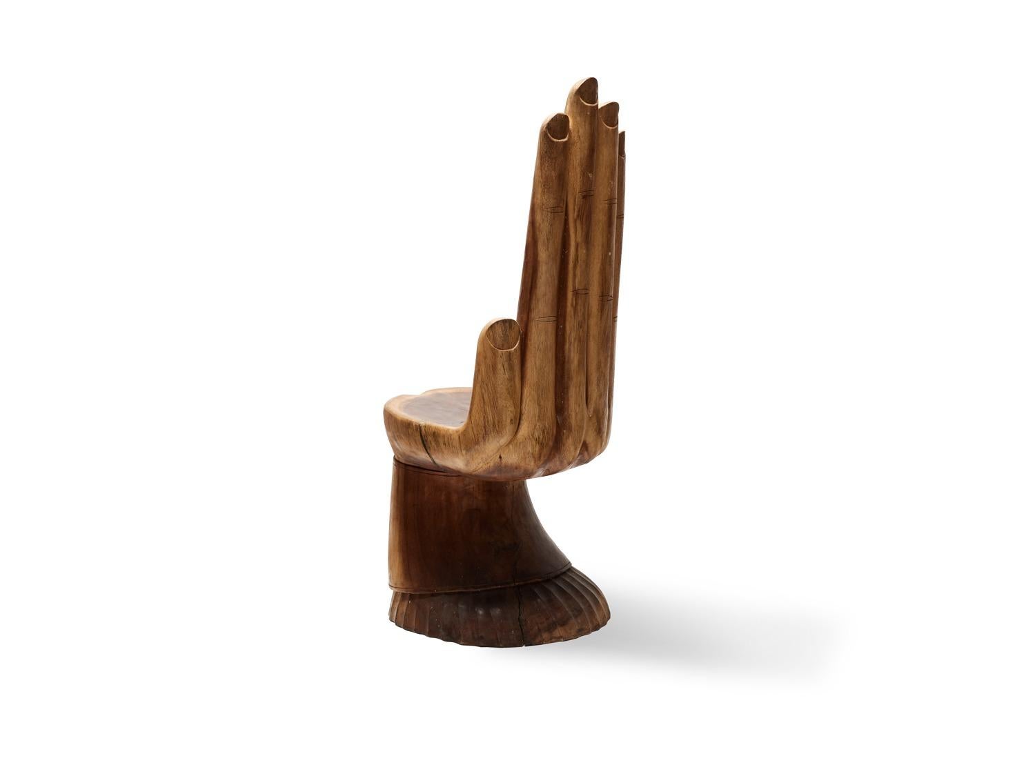 hand shaped wooden chair