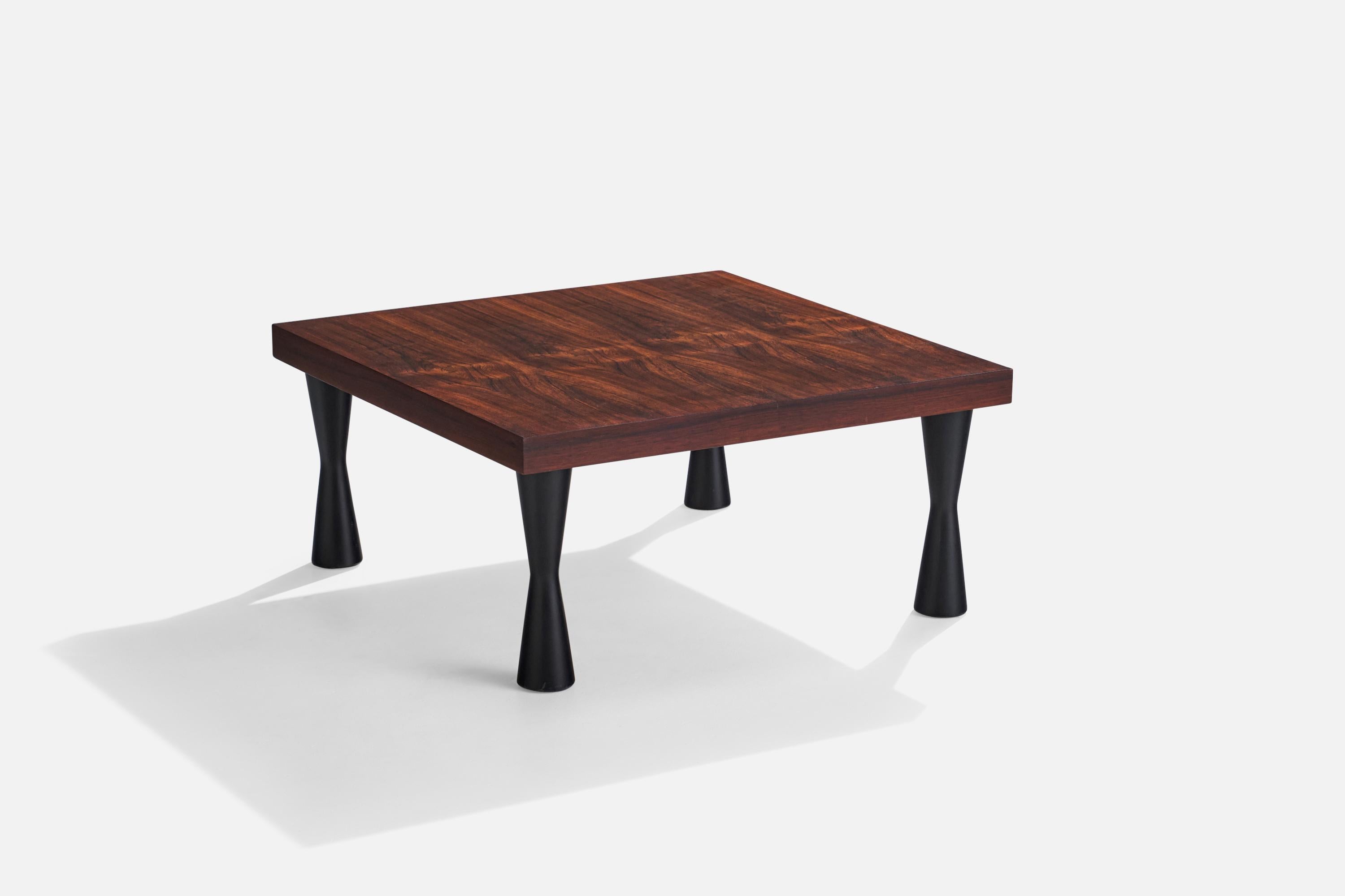 A rosewood coffee table designed and produced in Brazil, c. 1970s.